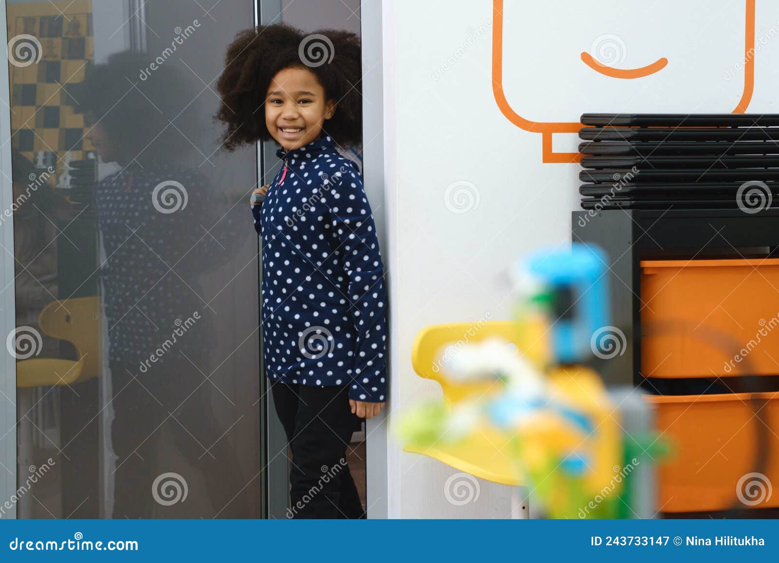 black girl at school entering class for lesson