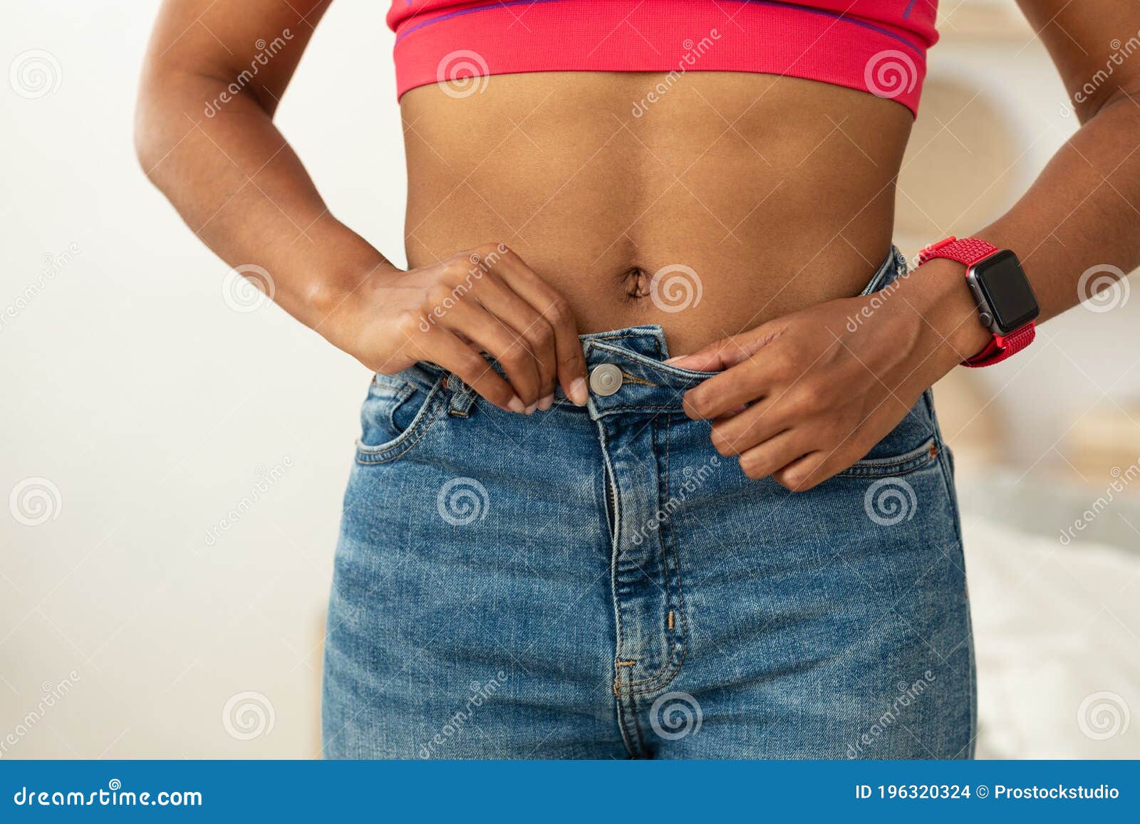 Skinny Weight Loss Woman Show Flat Stomach Pulling by Hand Oversized Big  Blue Pants Jeans. Slim Body Low Fat Healthy Size Athletic Stock Photo -  Image of large, body: 214863780