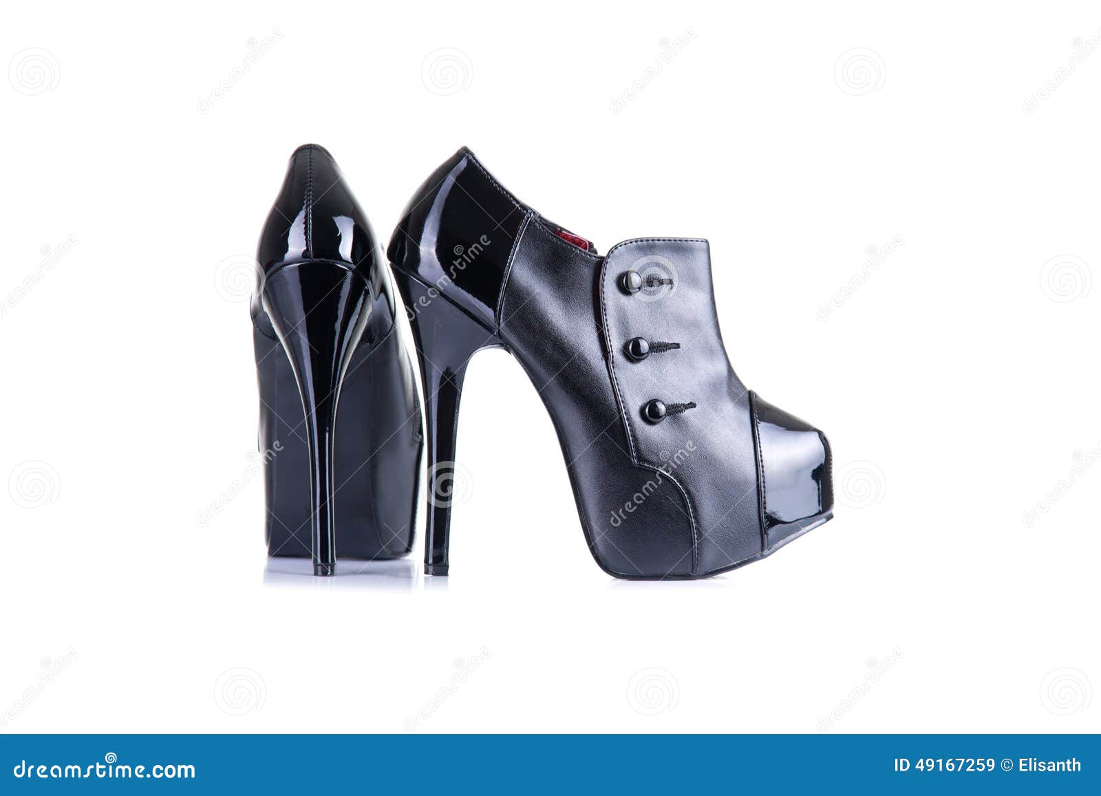 Black glossy female shoes, isolated on white background