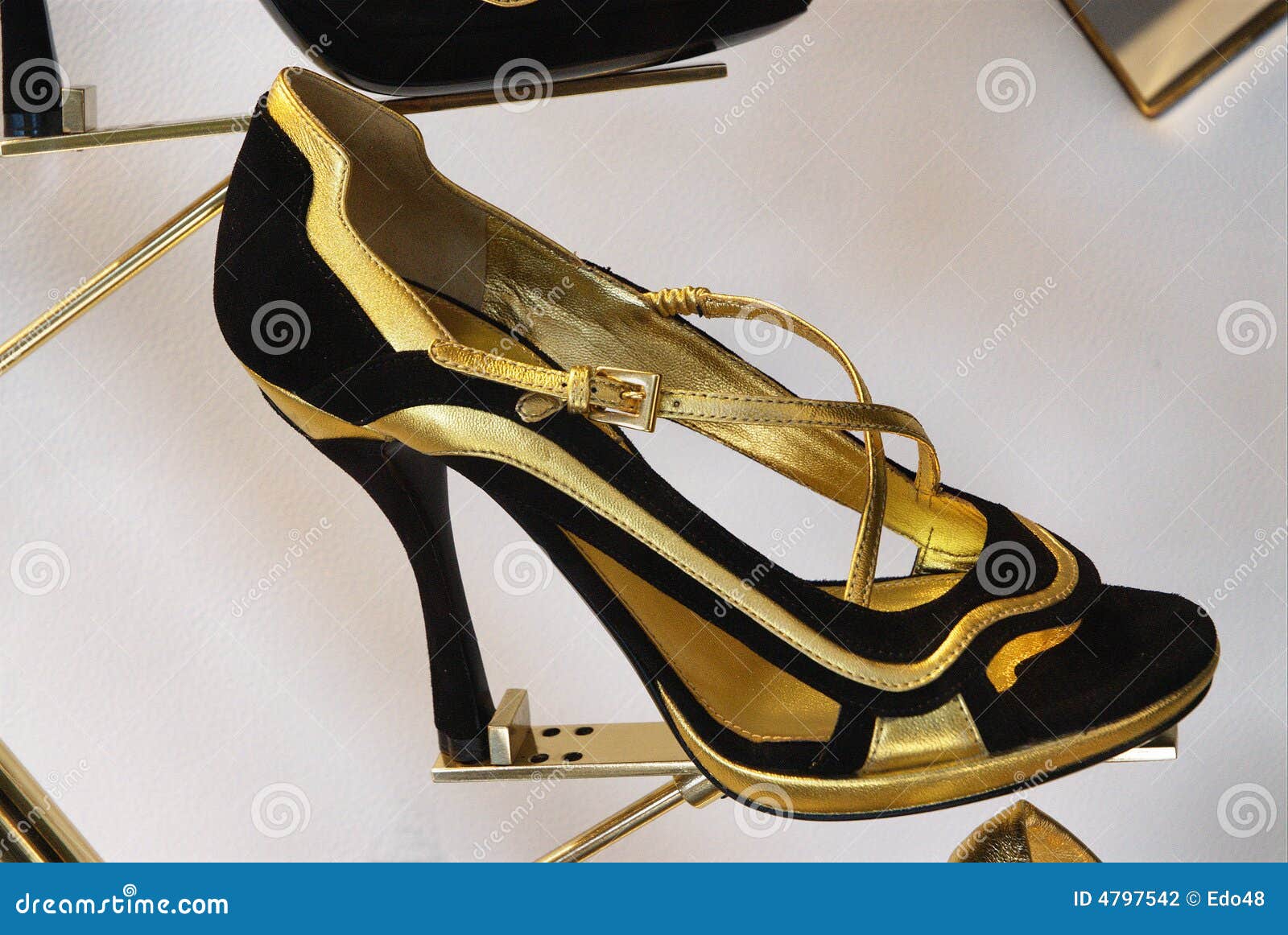 Black and gold female shoe stock photo. Image of luxury 4797542