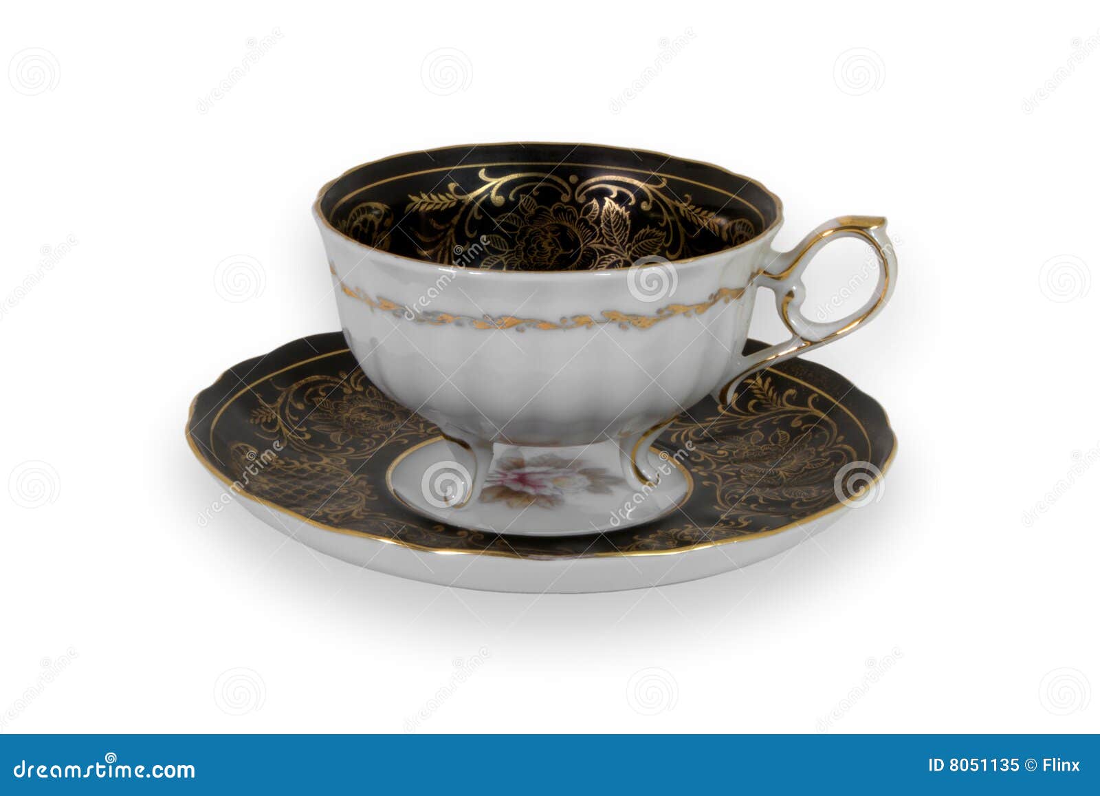 black and gold teacup