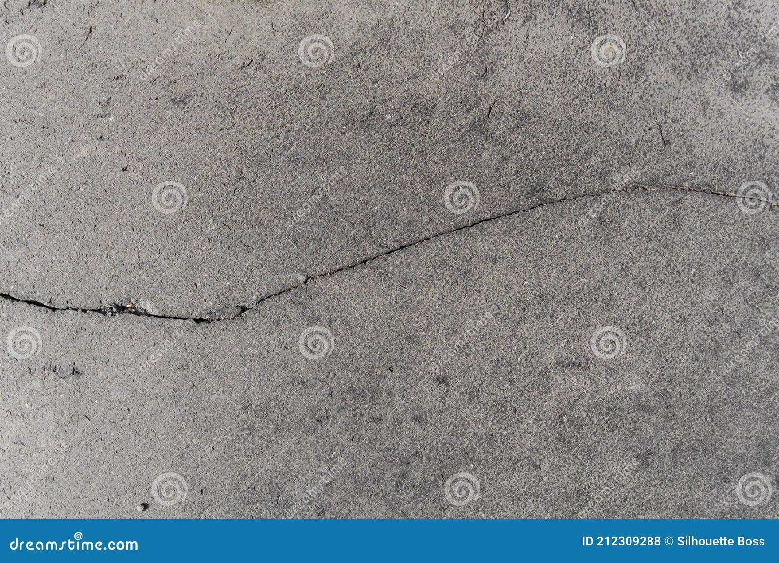 black gray basalt lava rectangular pavement cobblestones in cracked rectangular format texture. basalt lava paving stones textures