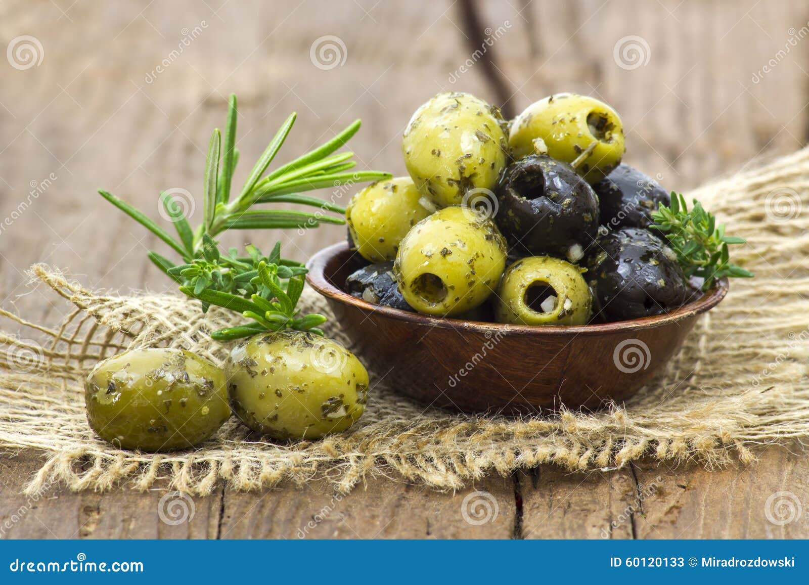 black and green olives marinated with garlic and fresh mediterra