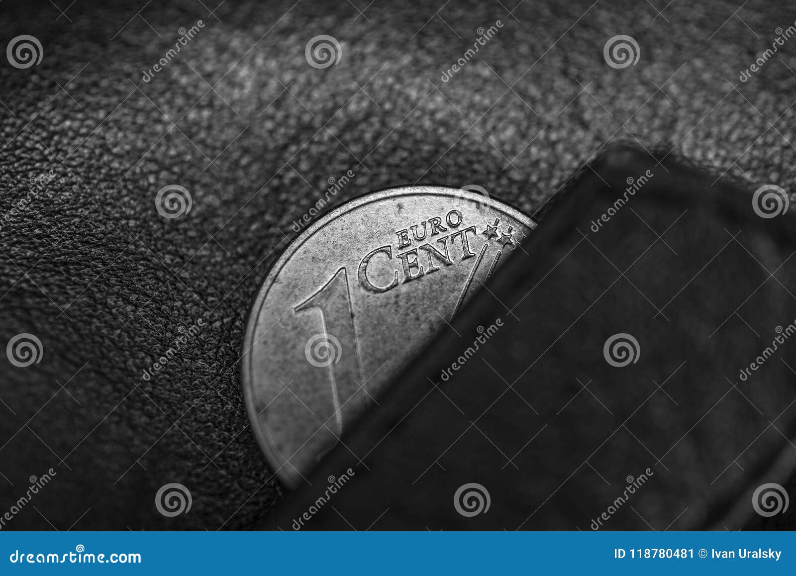 black and hite photo of black leather wallet and one cent of euro, to ize poverty, bankrupt or thrift, frugality