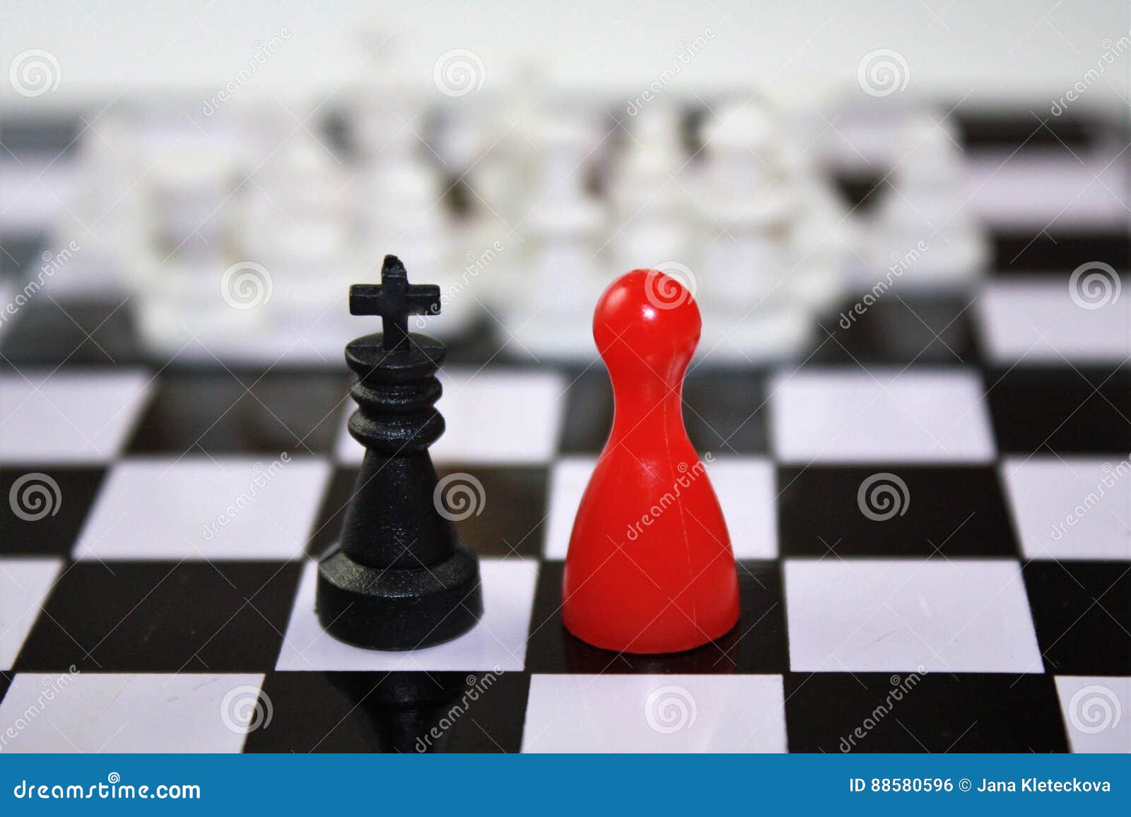 3d Rendering Of A Blurry Black King Chess Piece With Various Chess