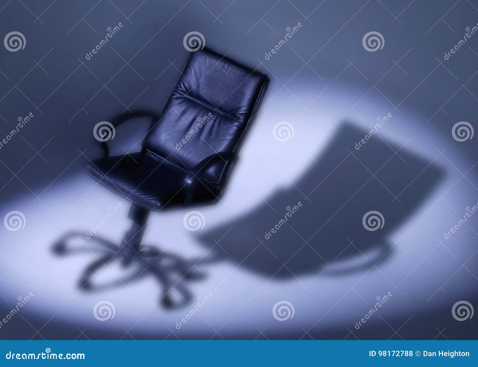Black Leather Office Chair in Spotlight Stock Photo Image of
