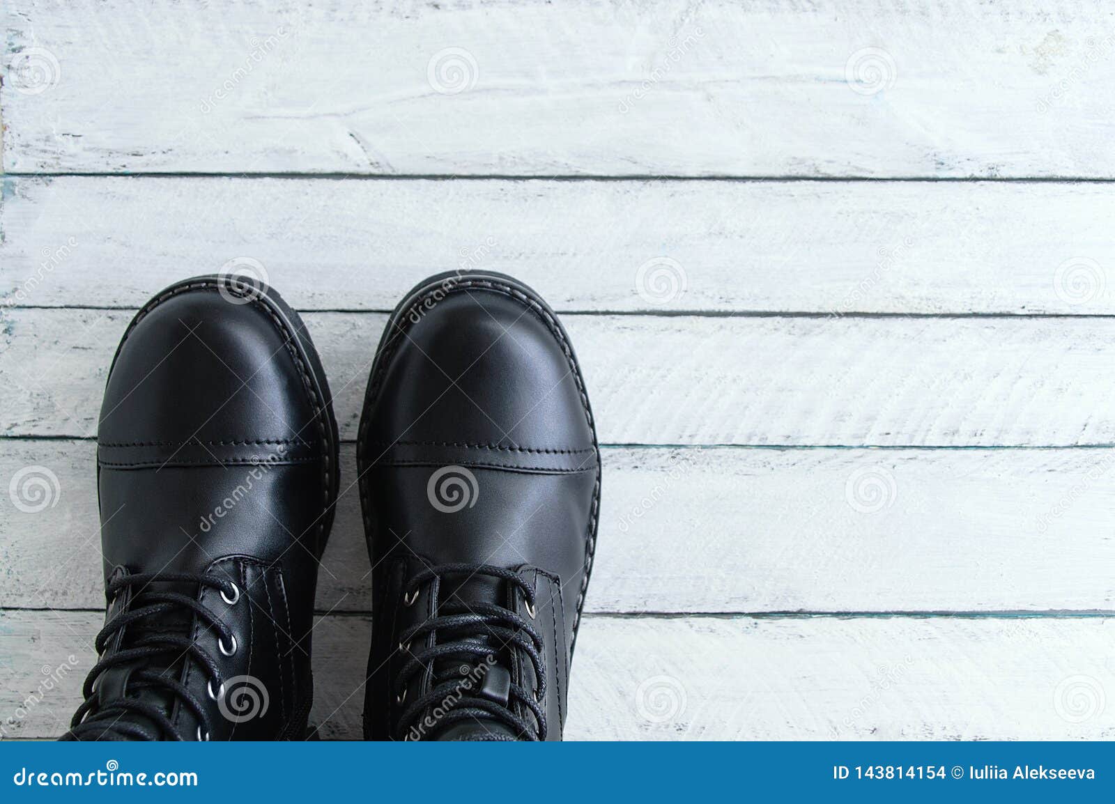 Black Leather Shoes with Laces on White Wooden Background. View from ...