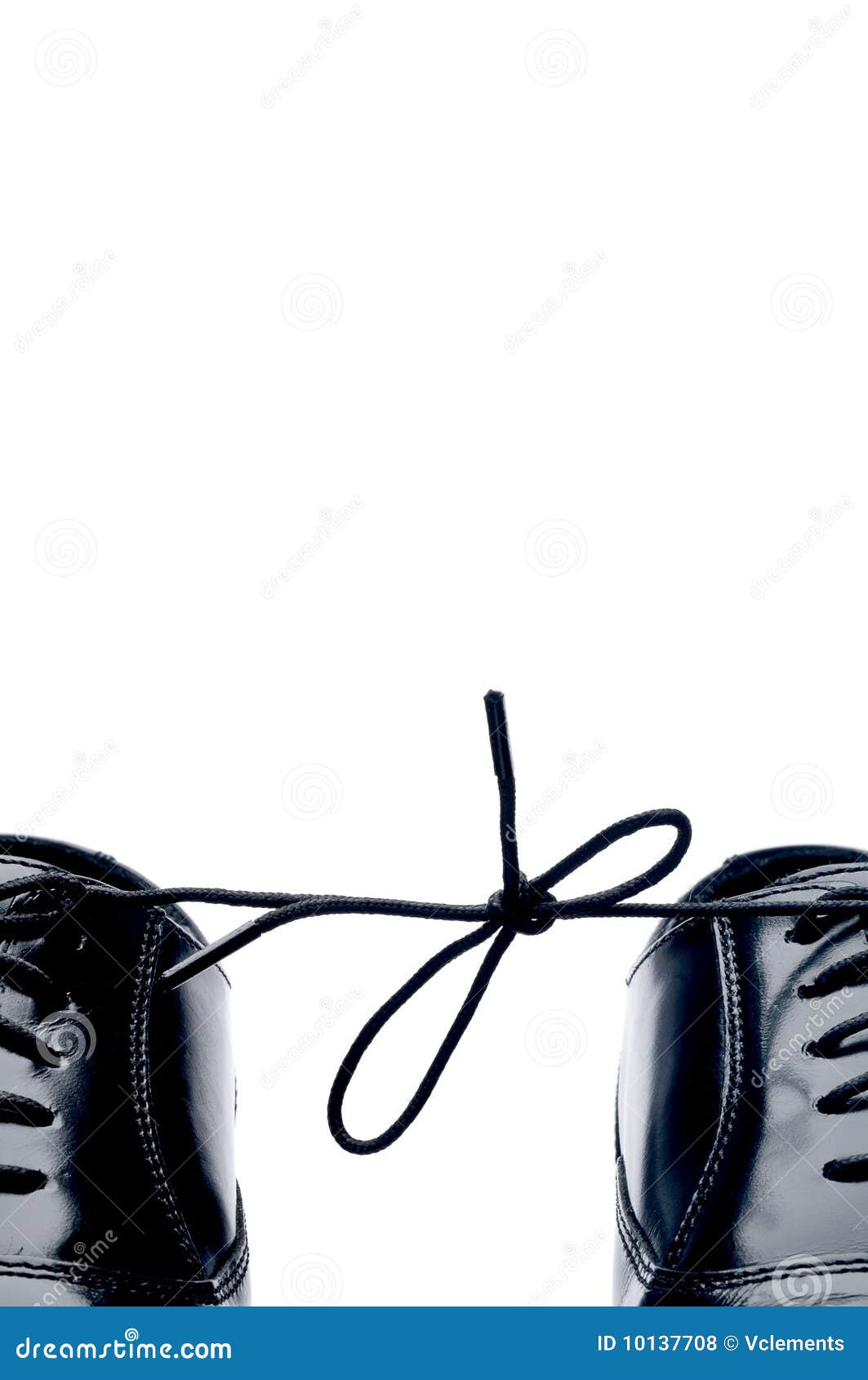 Black Leather Shoes with Thier Laces Tied Together Stock Photo - Image ...
