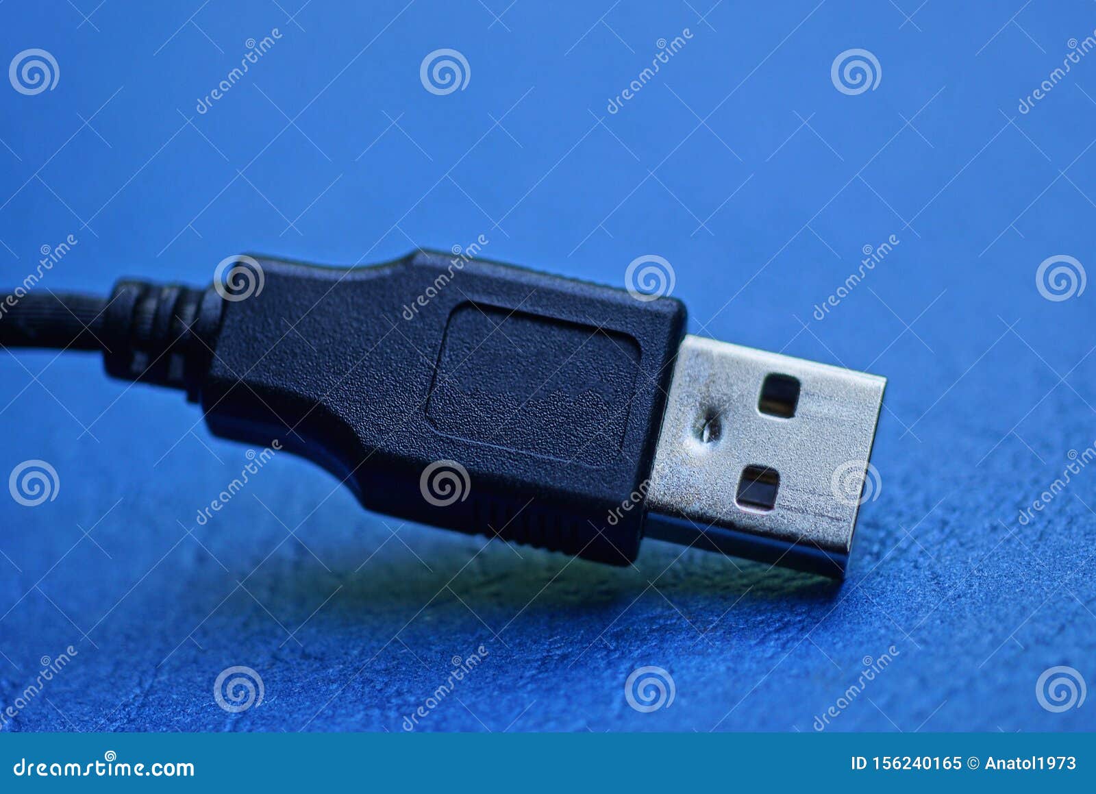 Long Usb Cord with Plug on a Blue Table Stock Image Image of cutout
