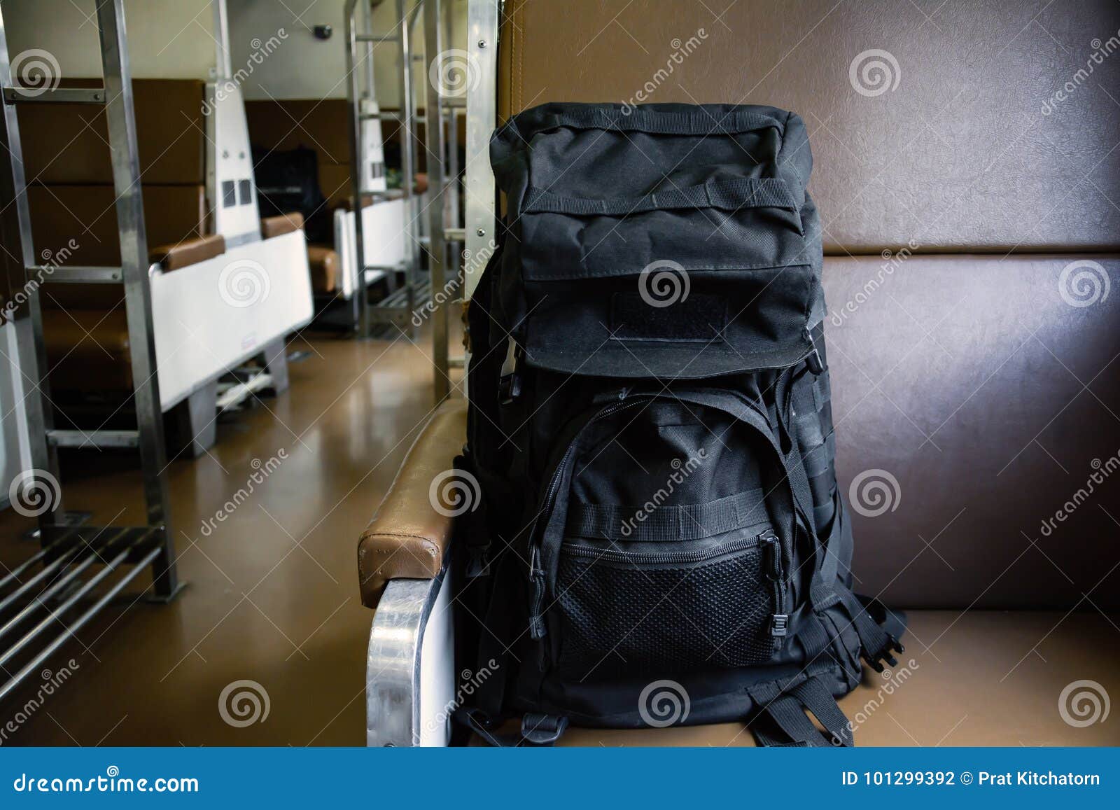 Black luggage on a chair stock photo. Image of rail 101299392