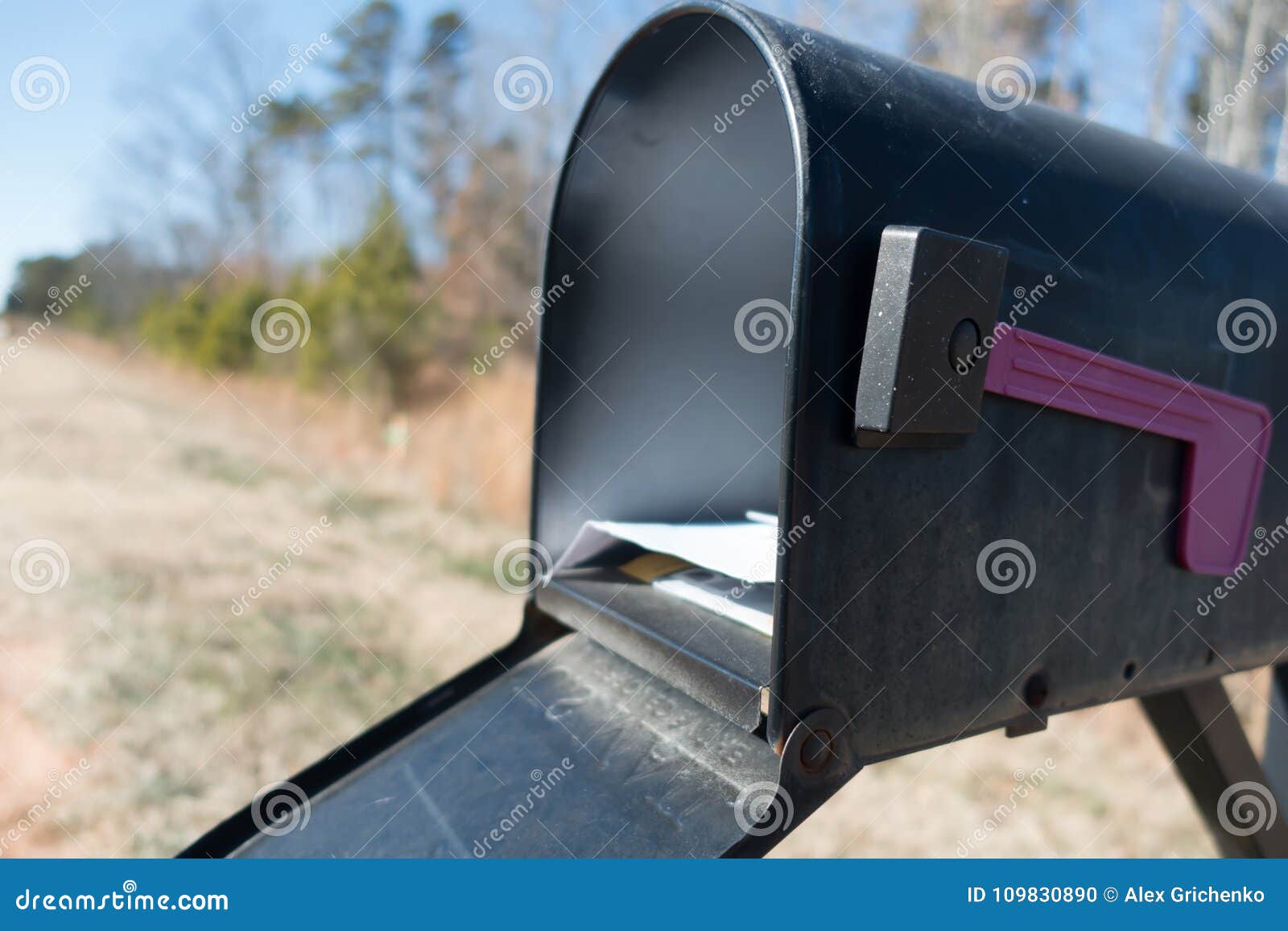 Black Mail Box and Post Office Mail with Blue Sky Stock Photo Image