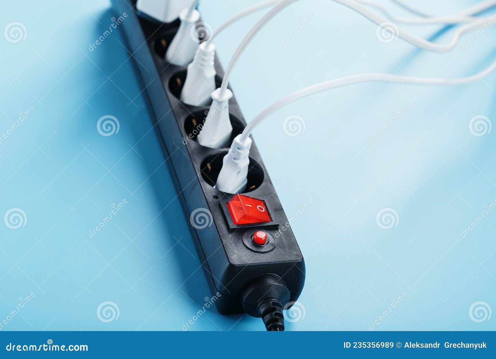 A Black Mains Filter with Electrical Outlets Inserted into it with