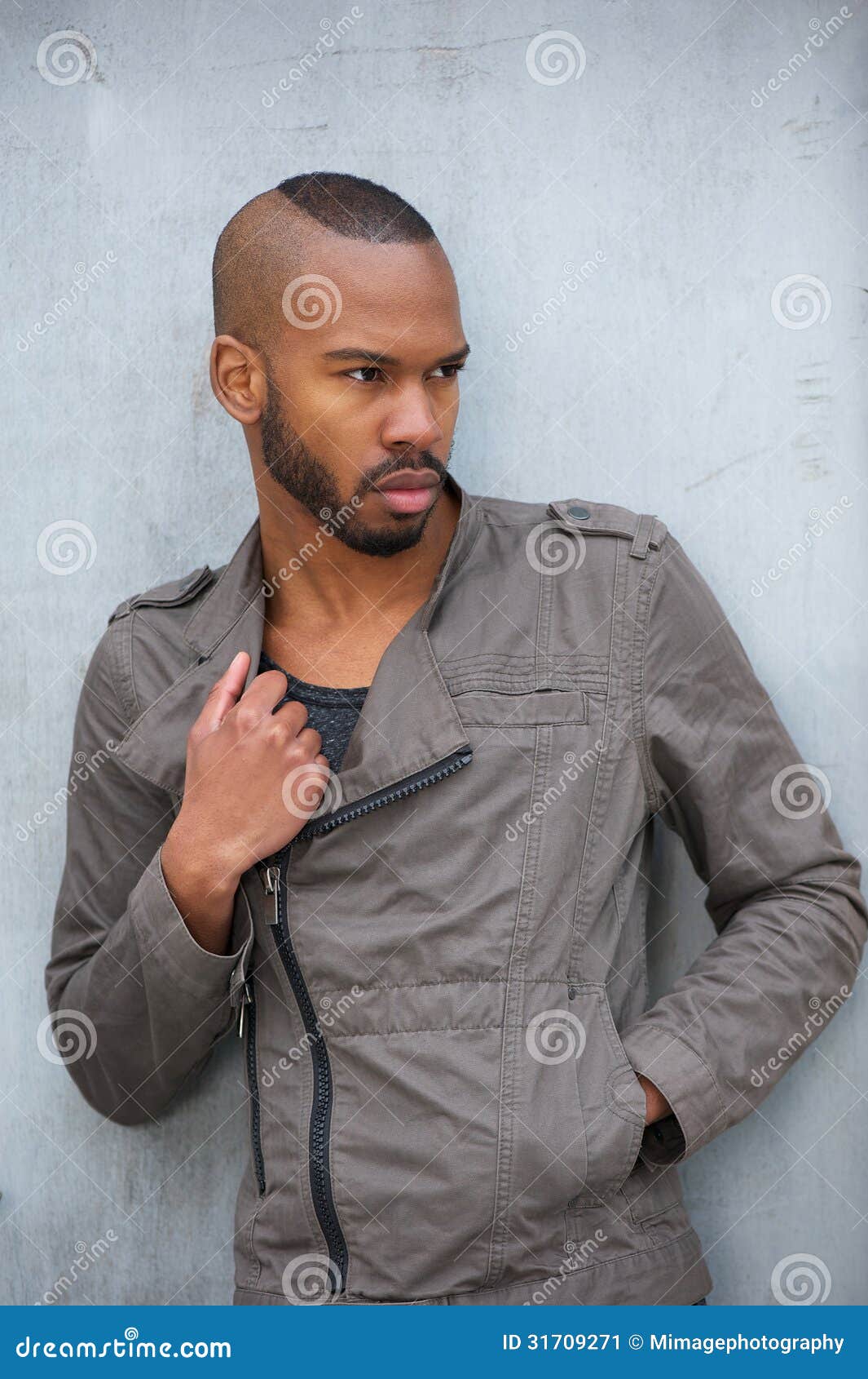 Black male model posing in blue studio in jeans and striped shirt on step  ladder - Free Photo (5XmRV4) - Noun Project