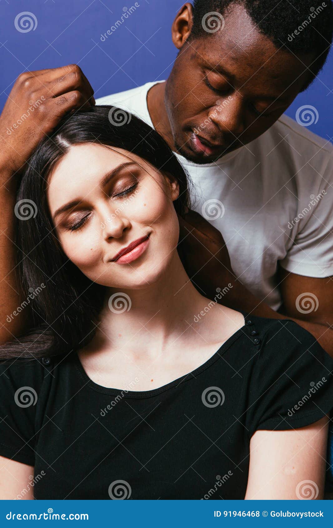 Black Man Caress White Woman Hair, Couple in Love Stock Photo