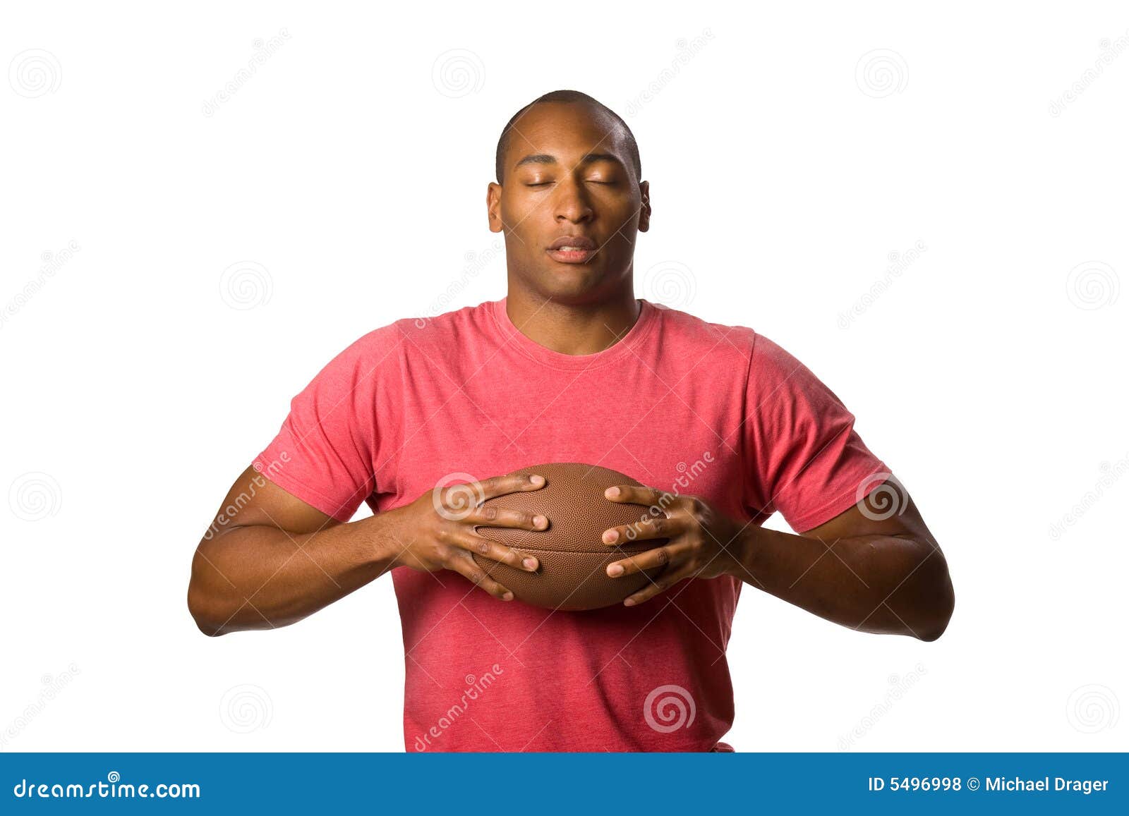 Black Man holding football stock photo. Image of copy 5496998