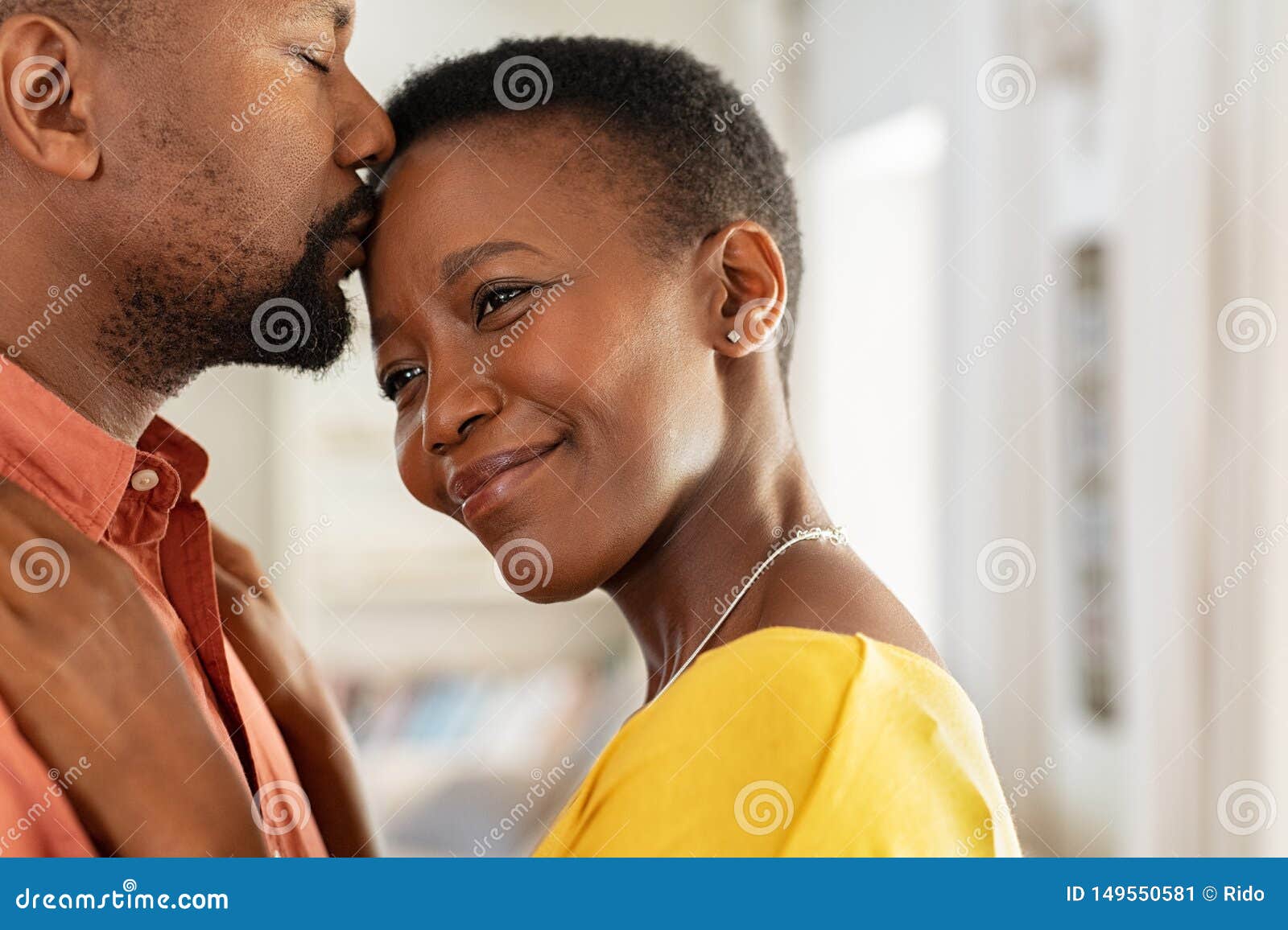 Black Man Kissing His Wife On Forehead Stock Image Image Of Embracing