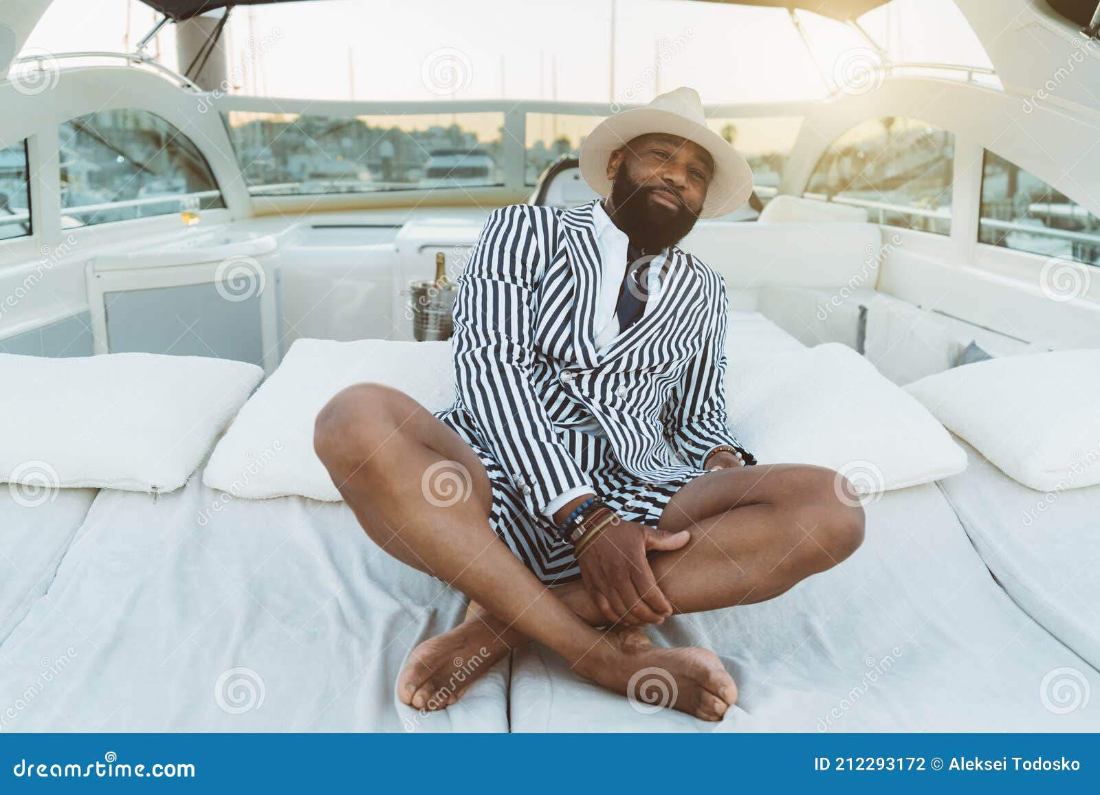 black man on yacht