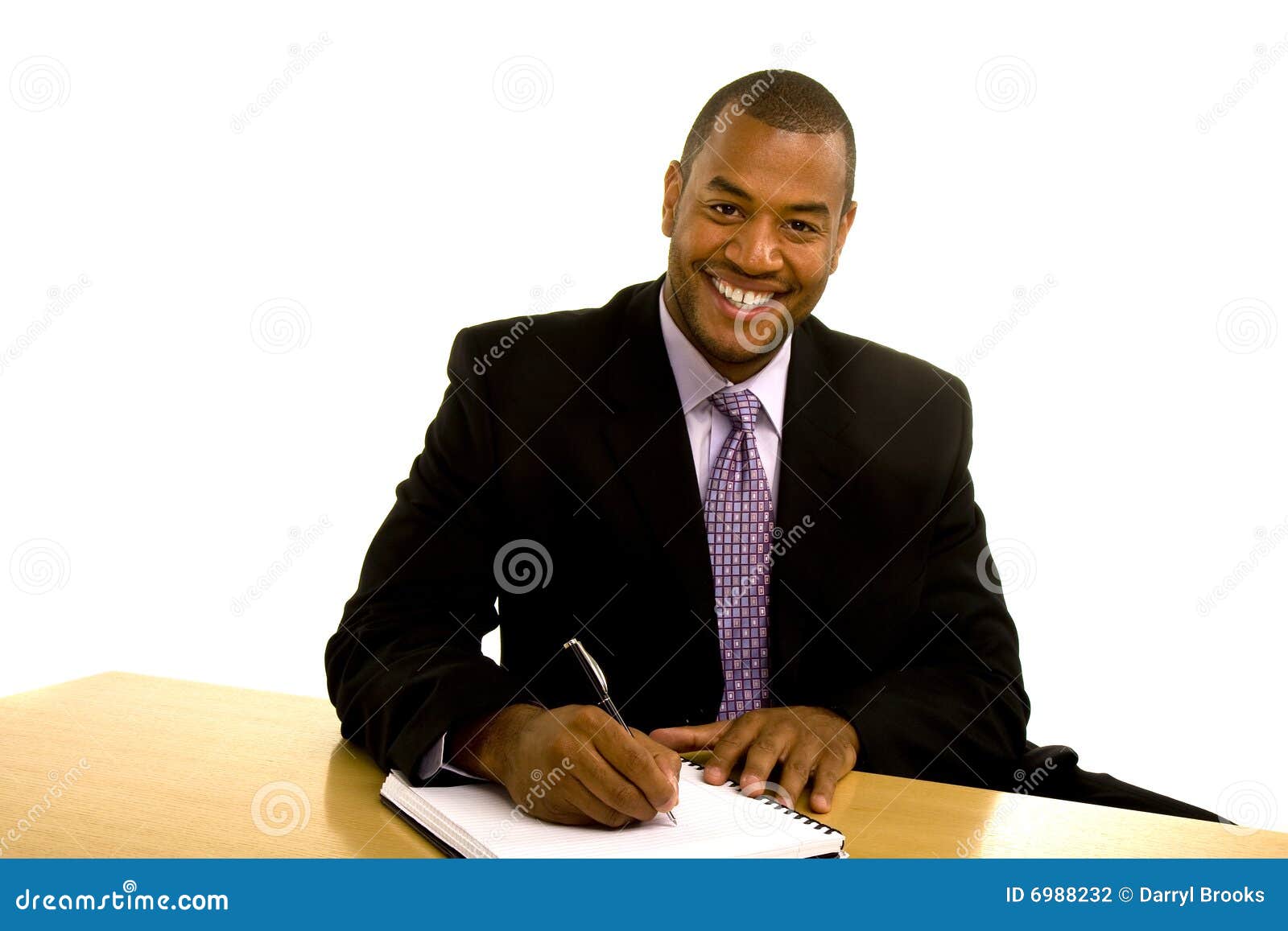 black man writing at