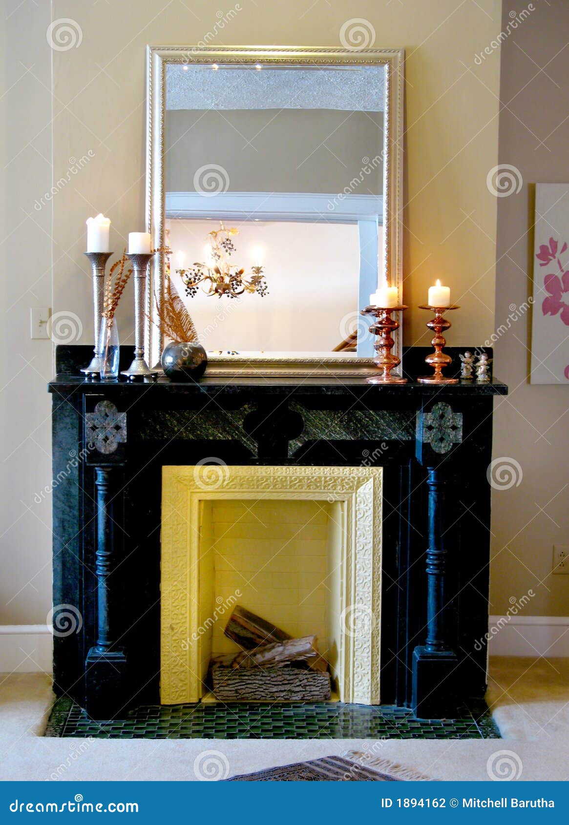 black mantle with mirror & candlesticks