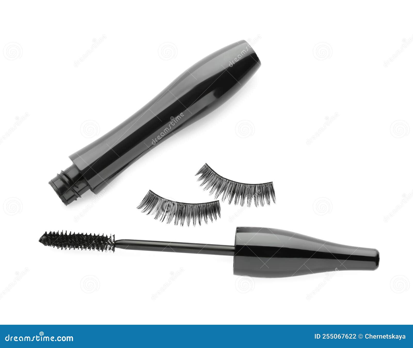 Black Mascara and Fake Eyelashes on Background, Top View Stock Photo