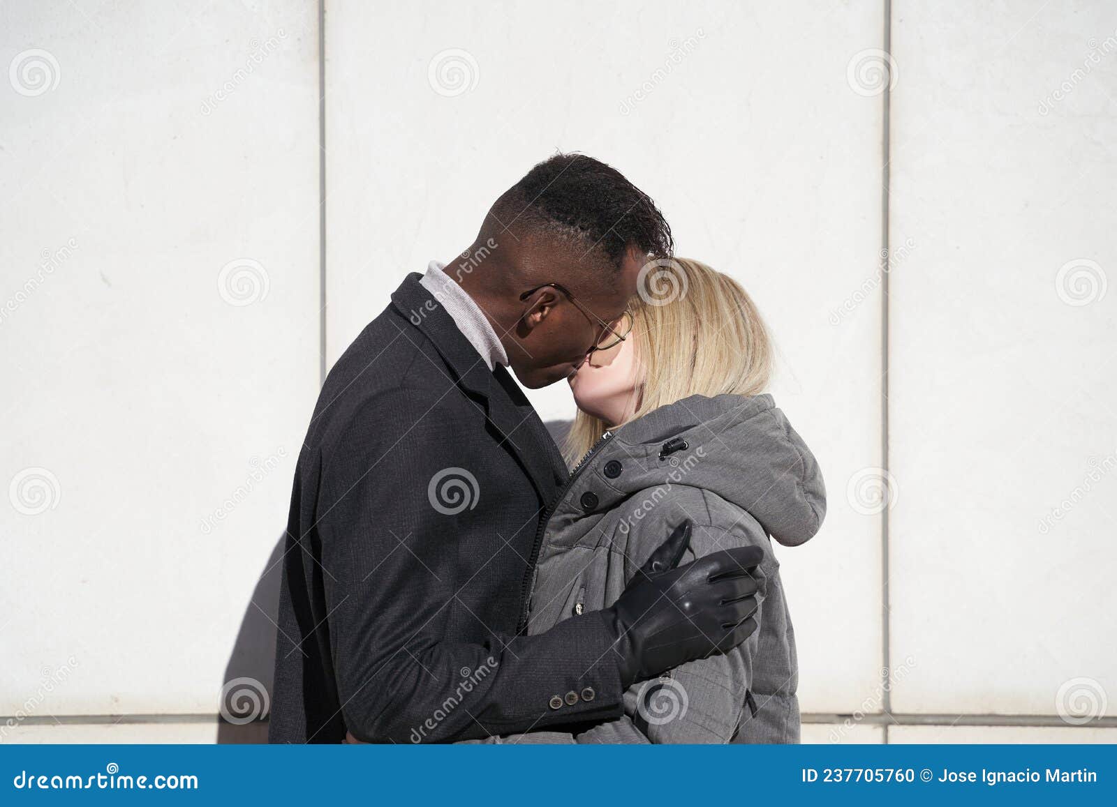 Young Interracial Couple Kissing image