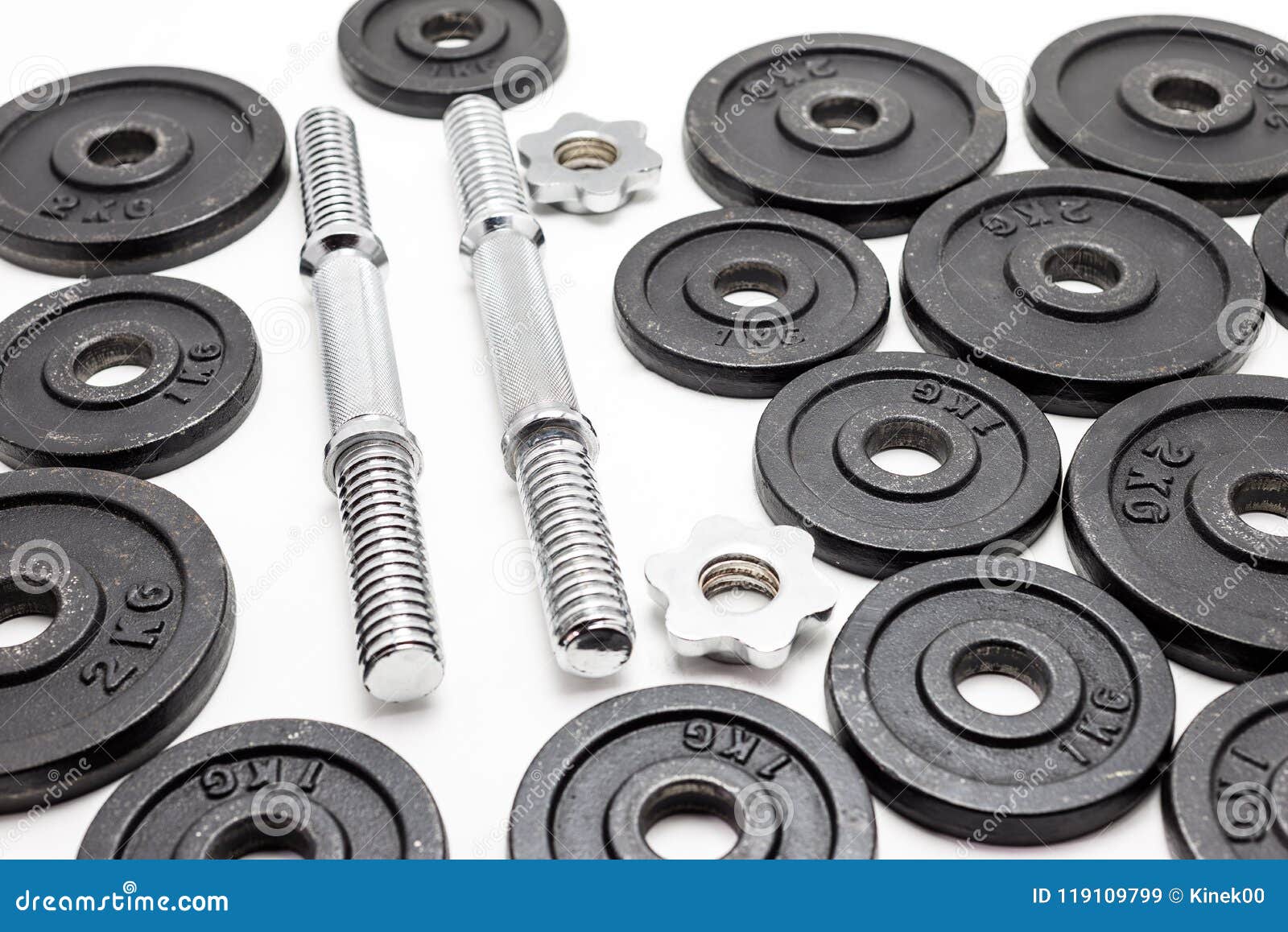 Black Metal Weights 1kg and 2kg on White Background. Stock Image