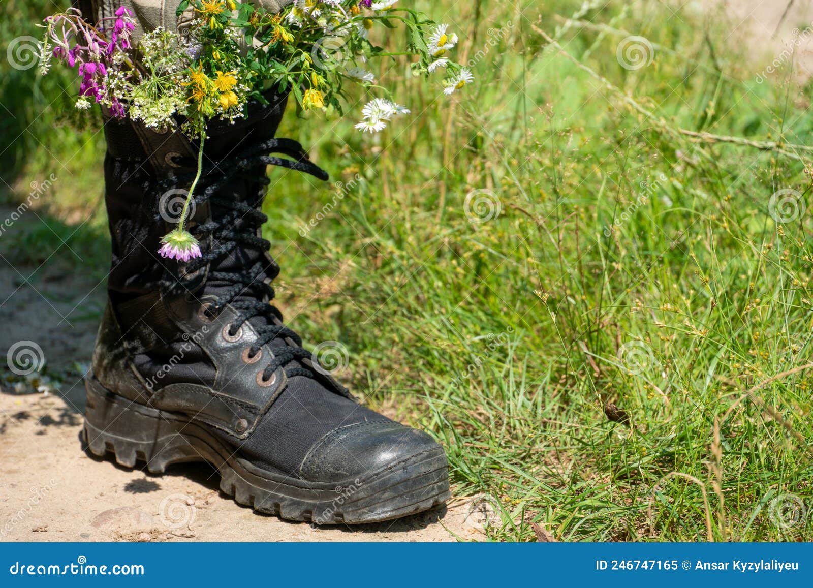 Black Military Boots with Flowers. Concept - Flowers instead of Bullets ...