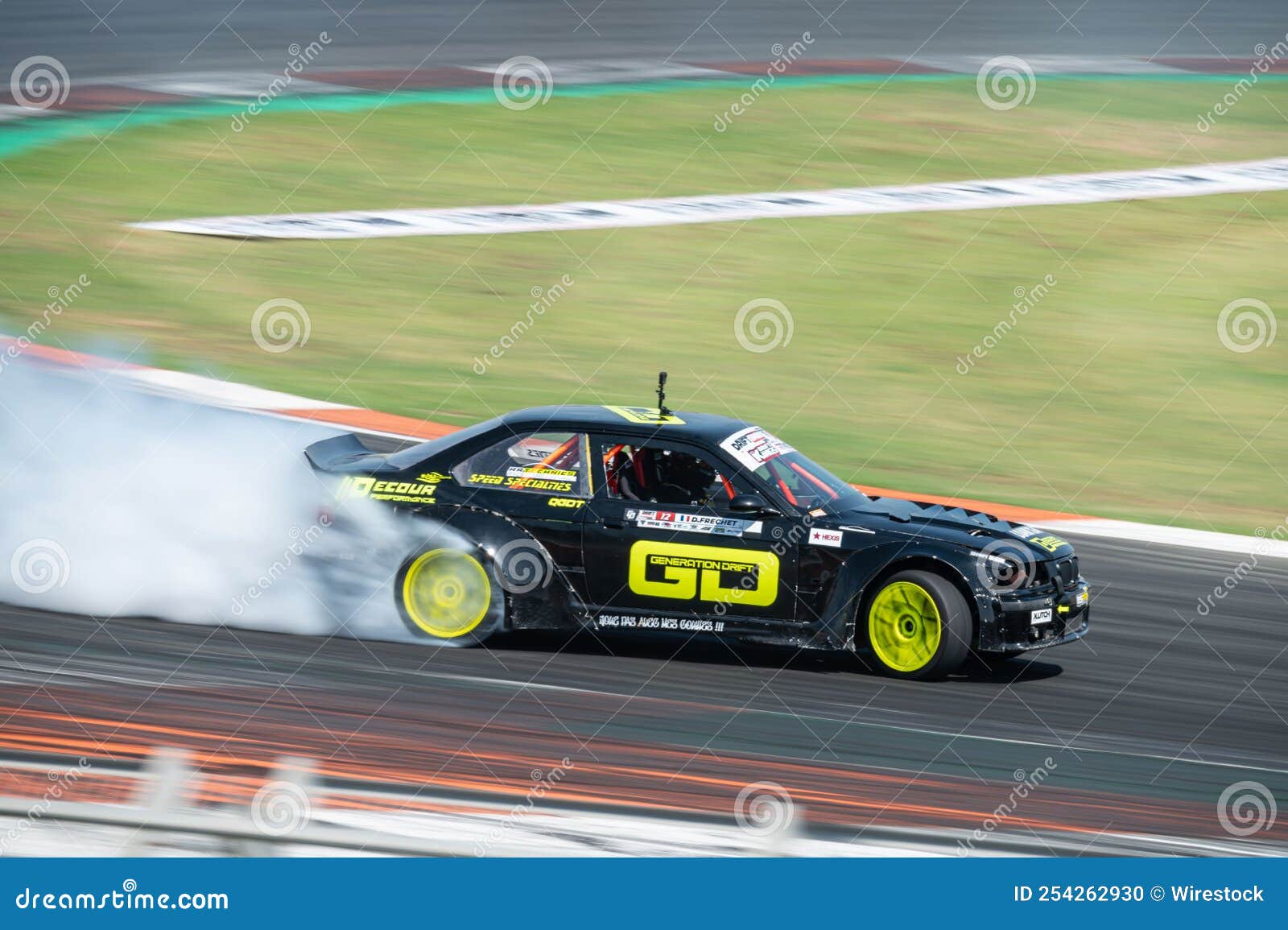 Black And Neon Green BMW E36 Producing Smoke On A Trail For A Drift