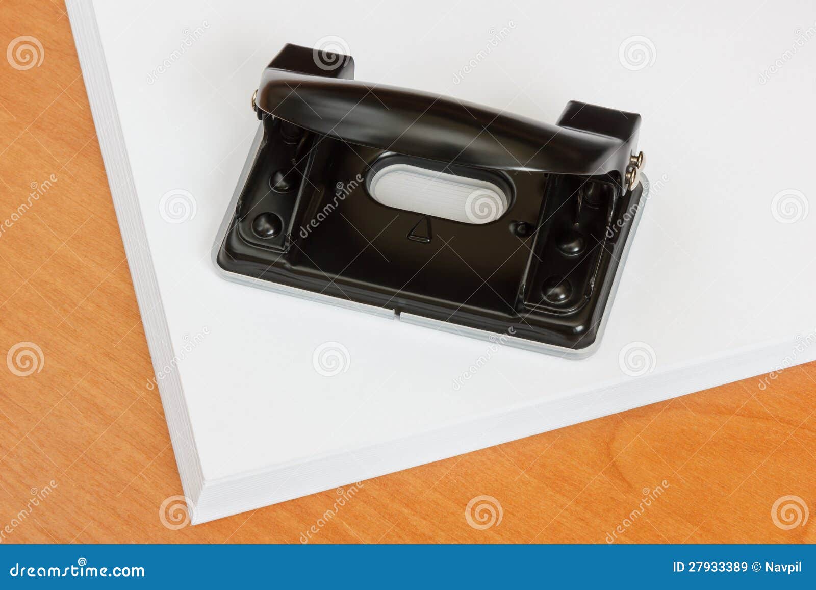 Black Office Hole Punch on a Paper Stack. Stock Image Image of