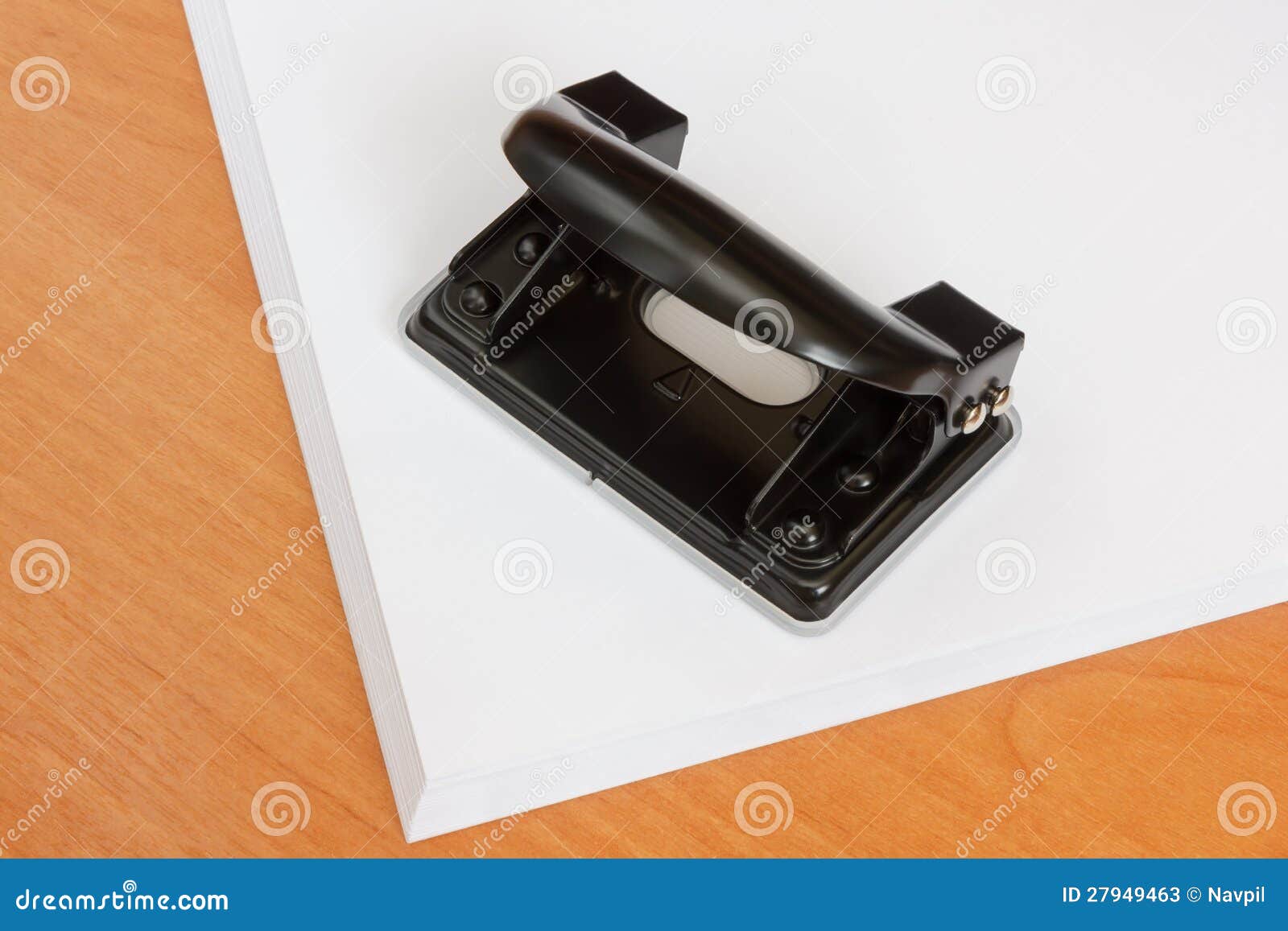 Black Office Hole Punch on a Paper Stack Stock Image Image of