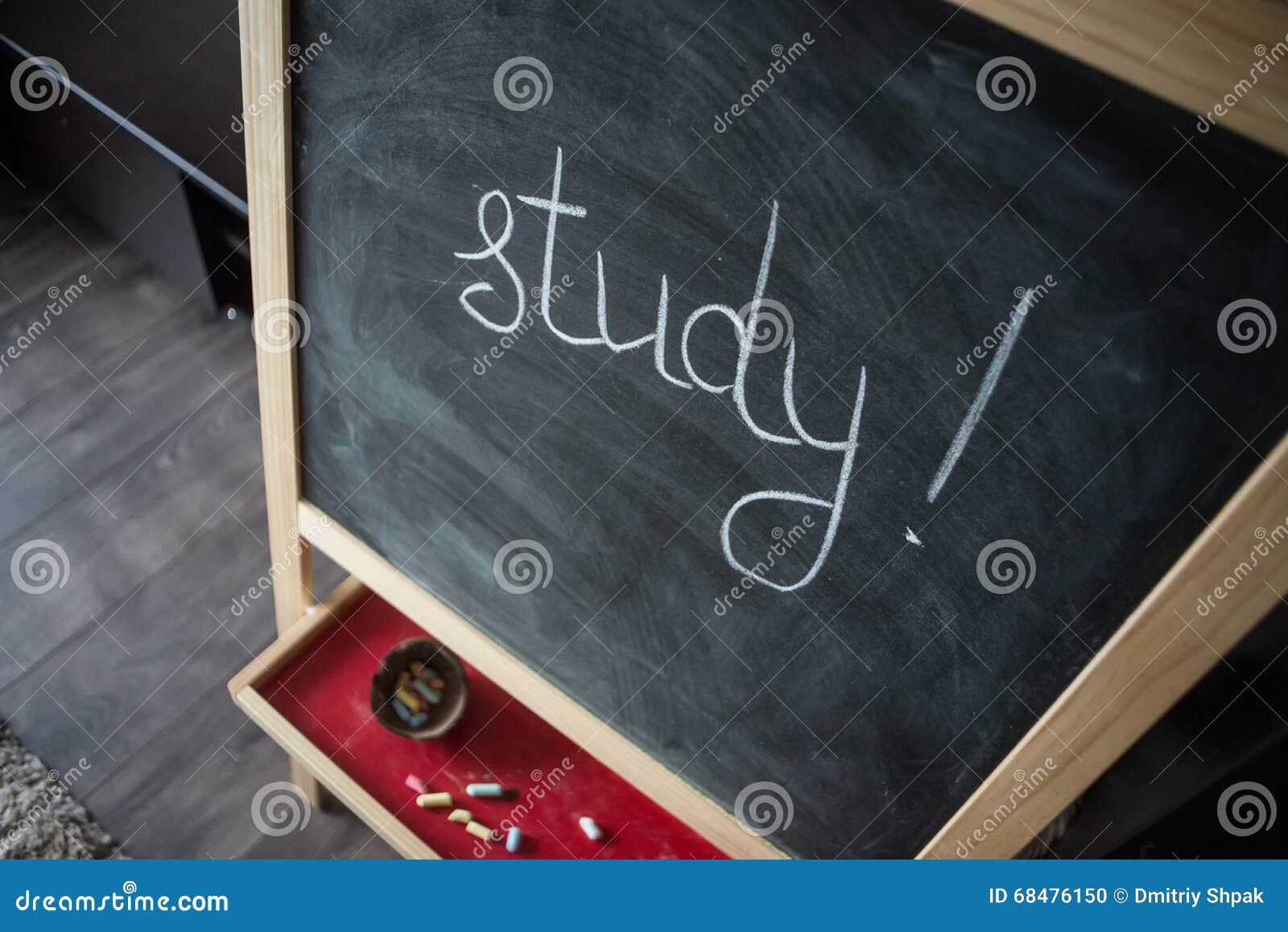 Black old empty chalkboard for copy space with colorful pieces of