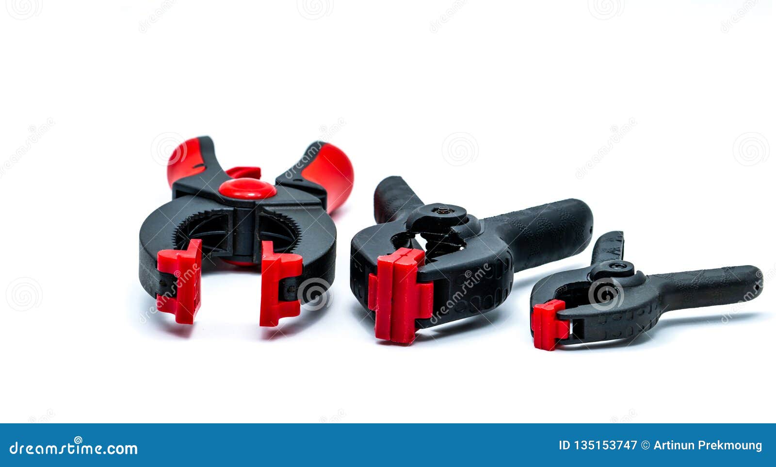 Black and Orange Spring Clamp Isolated on White Background. Set of