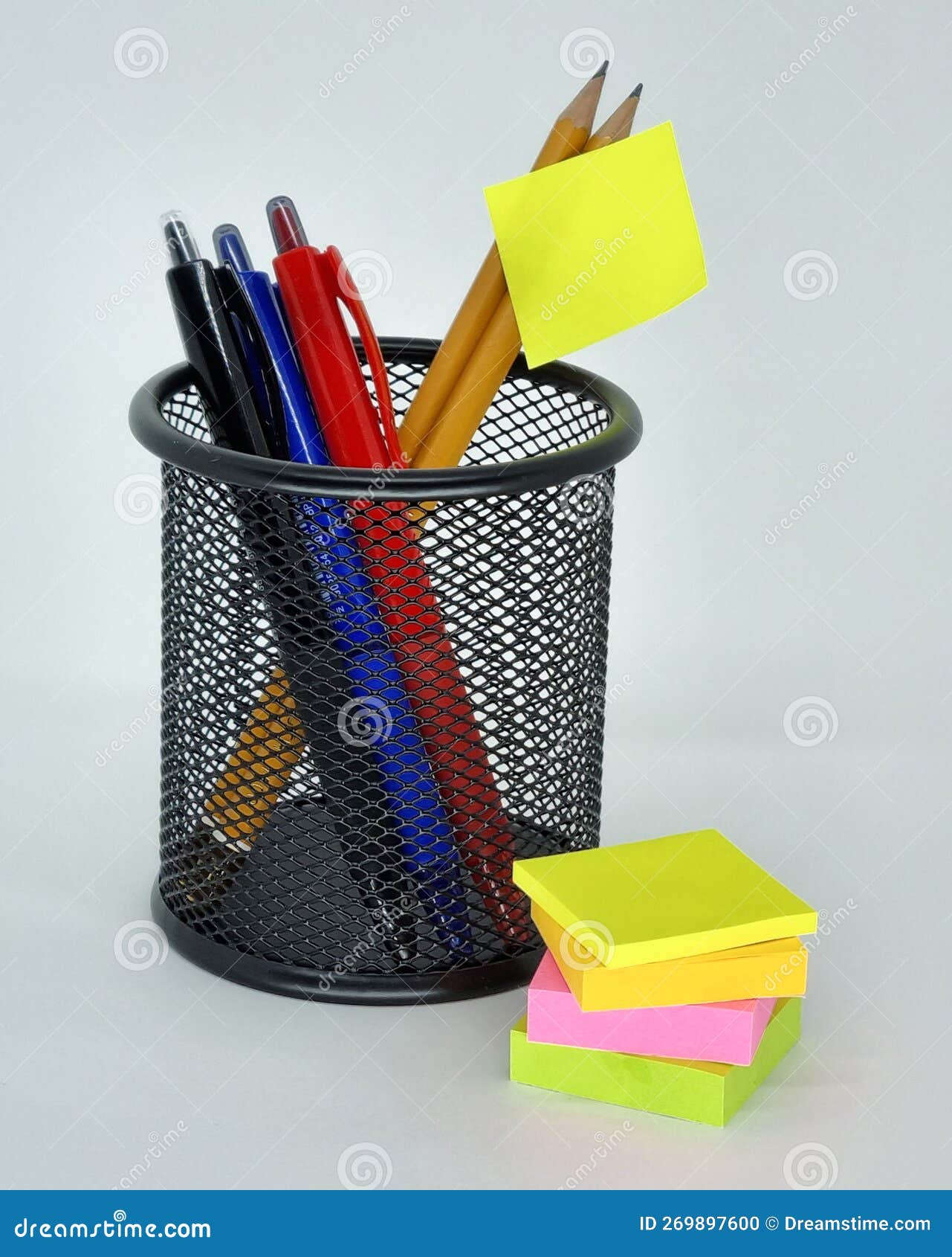 Black Pencil Holder with Pencils and Pens, with Sticky Notes on the