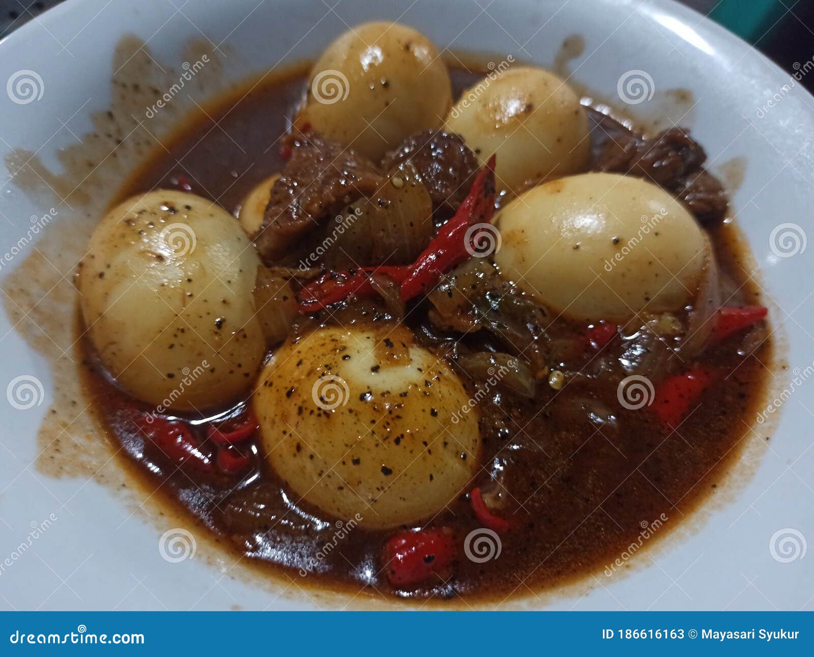 A Black Pepper Egg with Chilli Slices and Onions Stock Image Image of