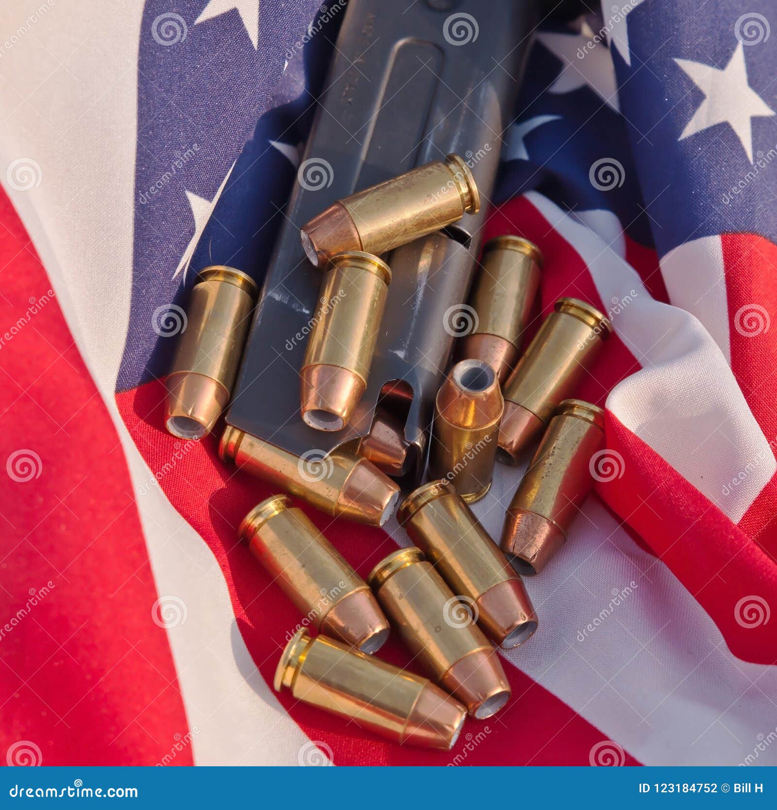 Download A Pistol Magazine With Bullets On An American Flag Stock ...