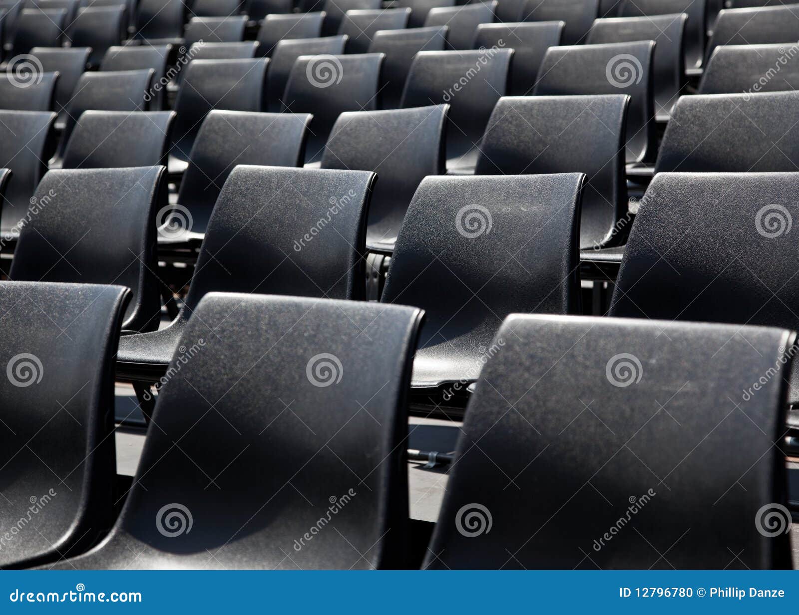 Black plastic chairs stock photo. Image of plastic, conference 12796780