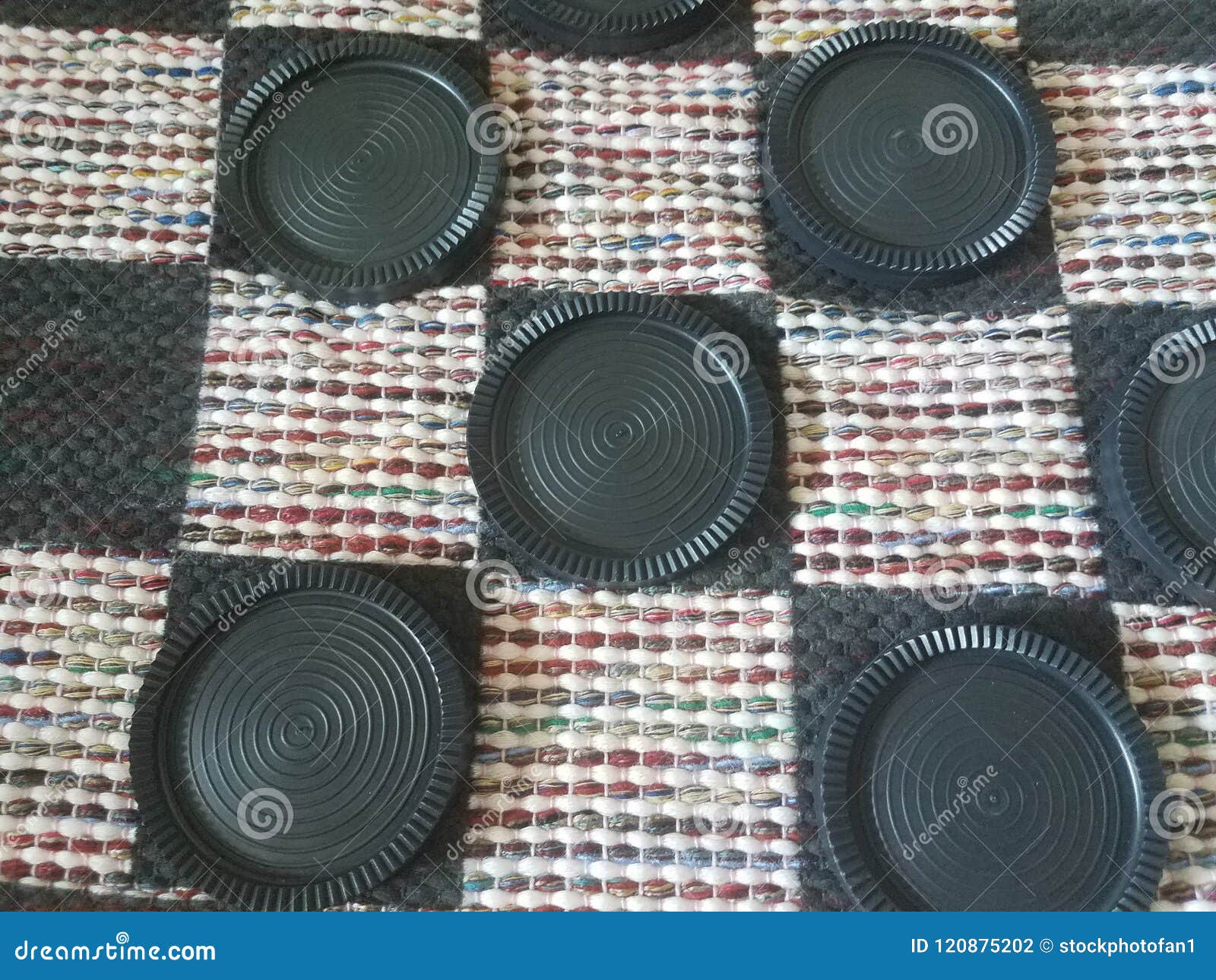 Black Plastic Checkers on Fabric Board Stock Photo Image of plastic