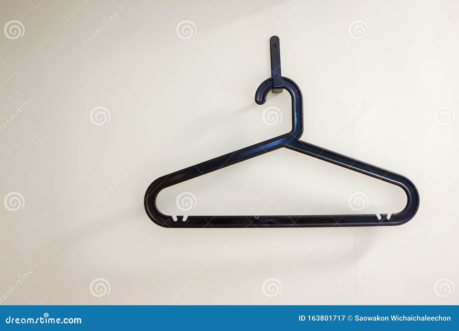 A Black Plastic Coat Hanger with a Trouser Bar Stock Image Image of