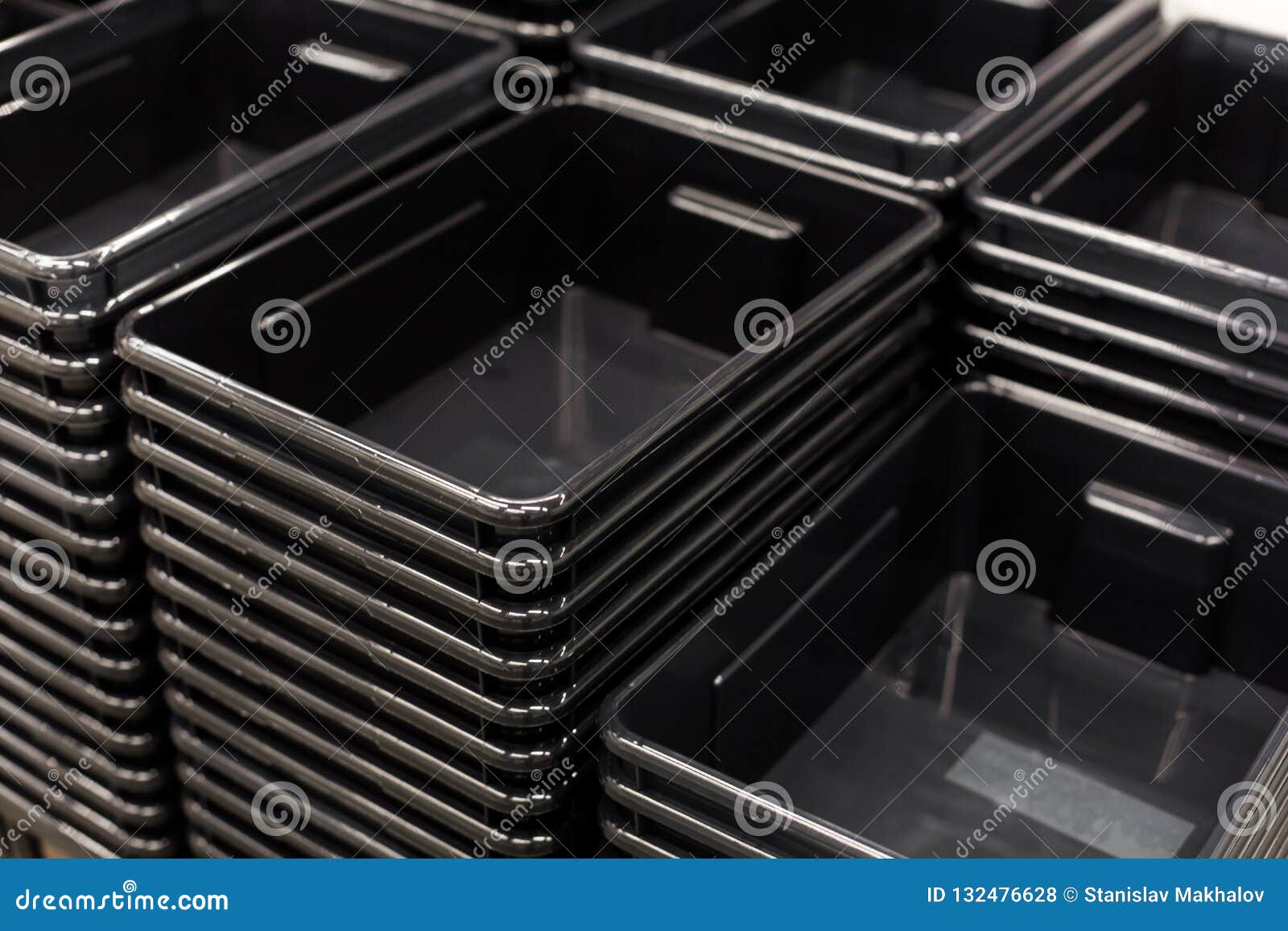 Black Plastic Containers Stack in a Store Stock Photo Image of