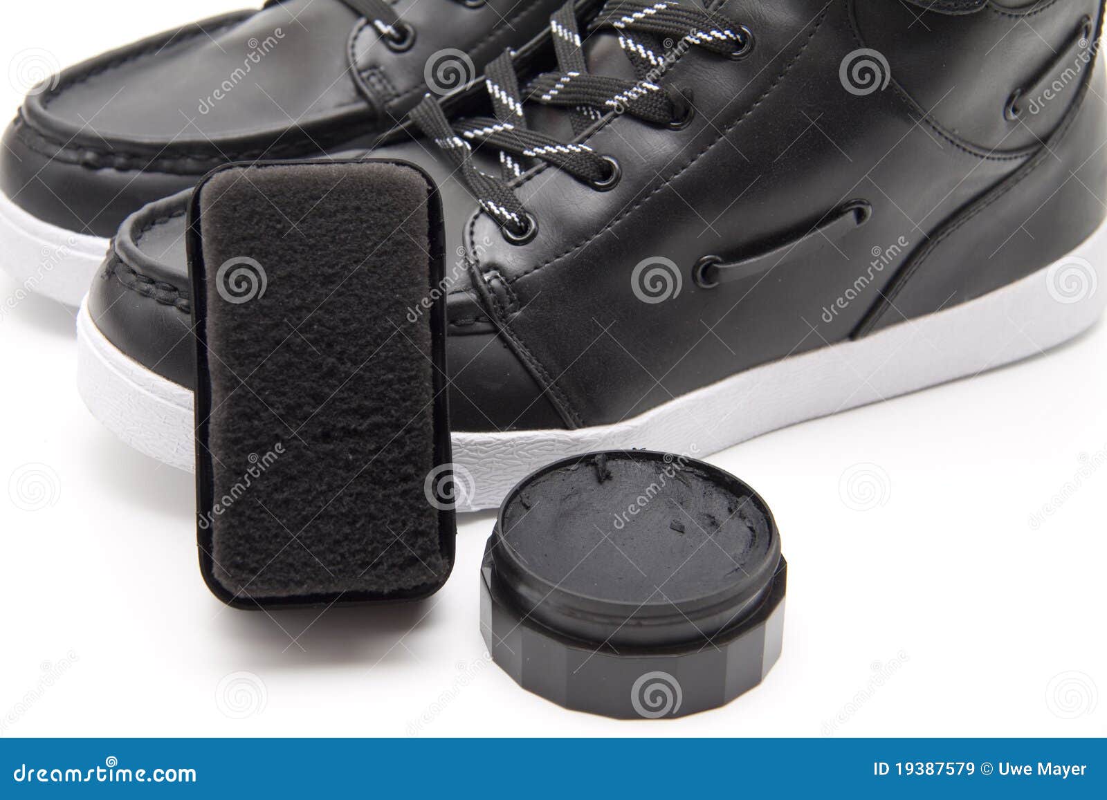 Black polish with sponge stock image. Image of clothing 19387579