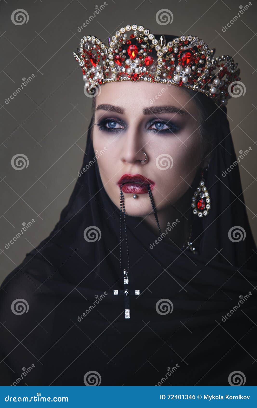 Black Queen in a Crown and with a Crucifix Stock Photo Image of model