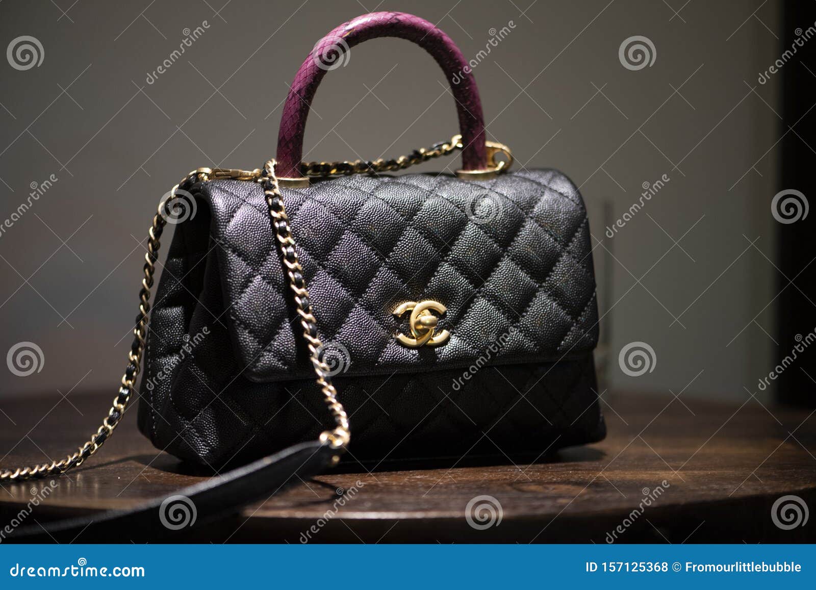 chanel black quilted bag silver chain