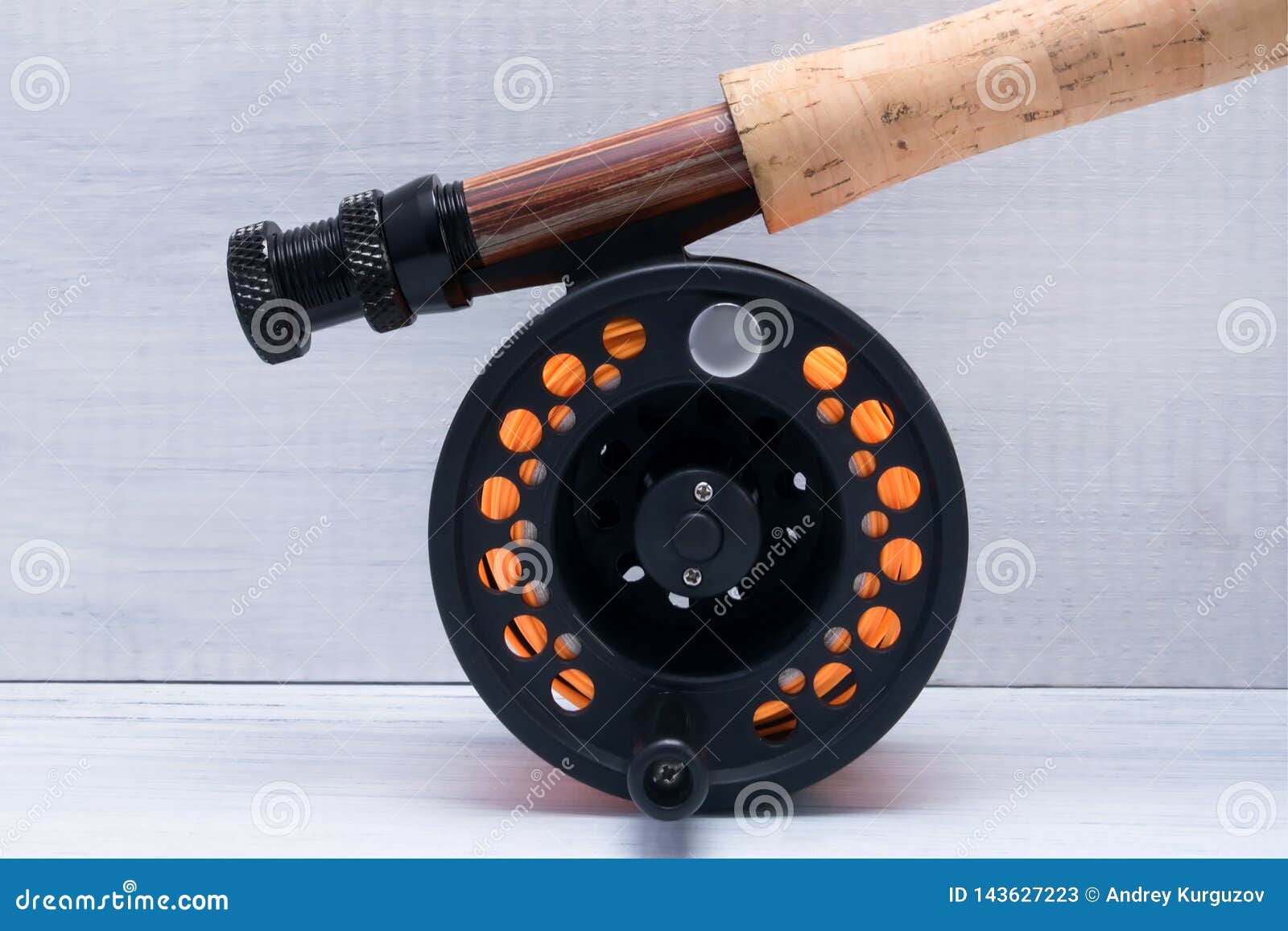 Black Reel with Orange Fishing Line on Fishing Rod Close Up on a Light  Background Stock Image - Image of background, artificial: 143627223