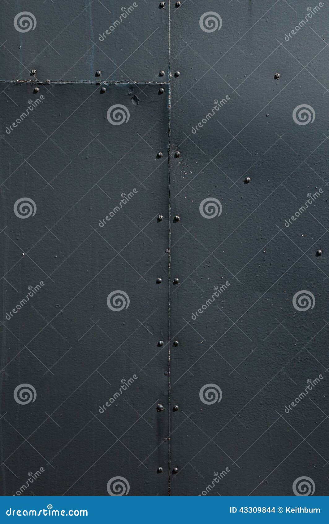 Black Riveted Sheet Metal Door Background Stock Photography