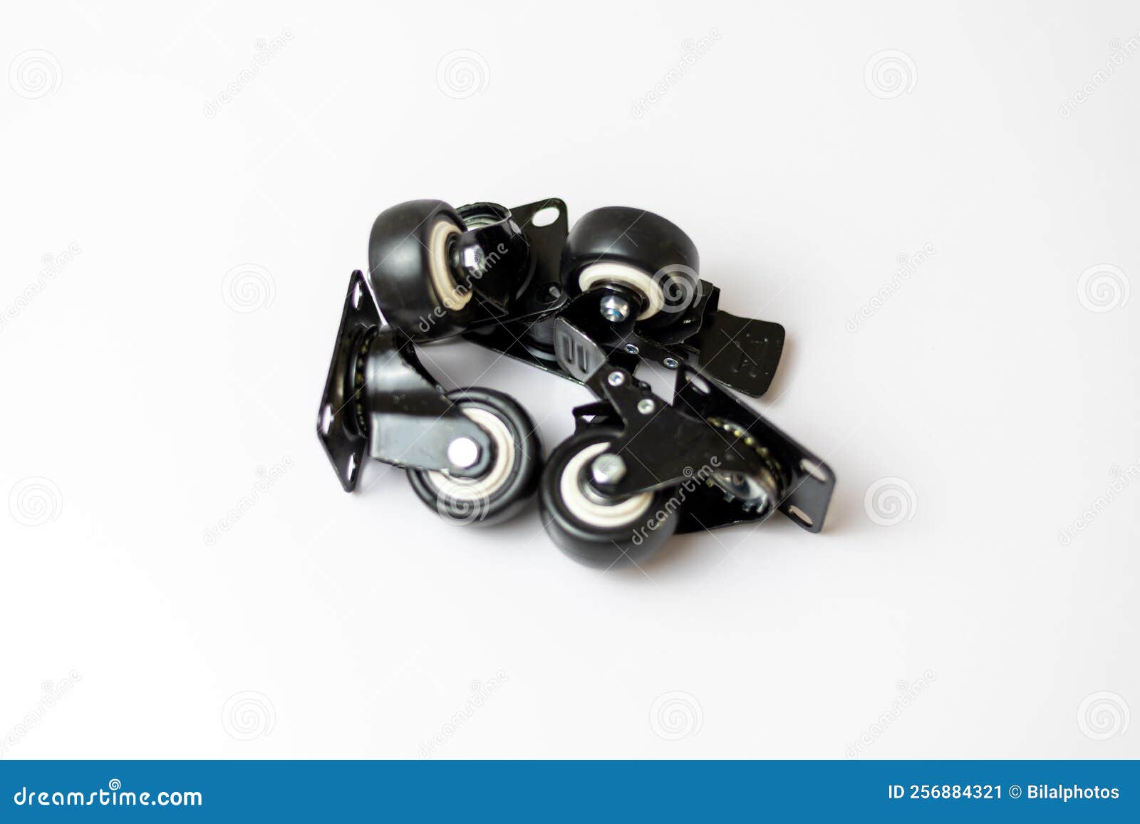 black rubber tyre with lock function on a white  background with selective focus