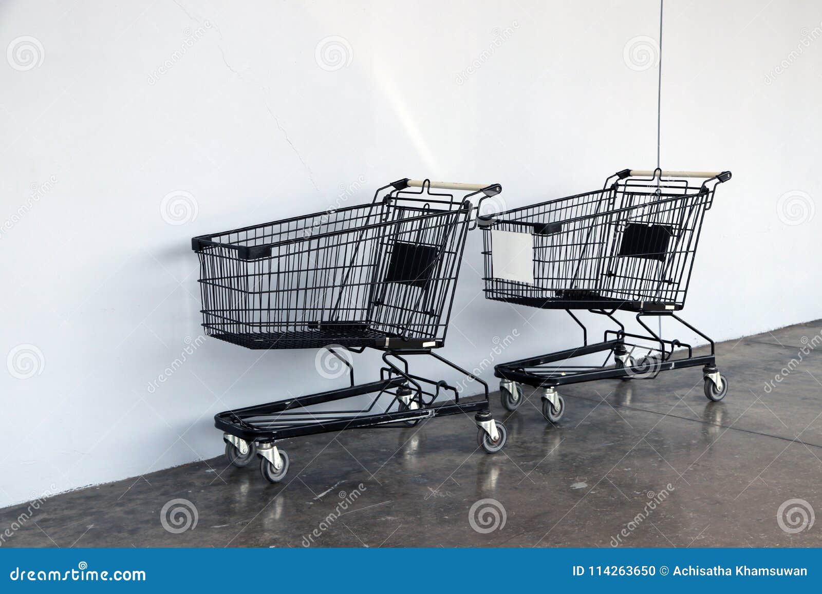 Black Shopping Cart on the Floor and White Background. Trolley is a ...