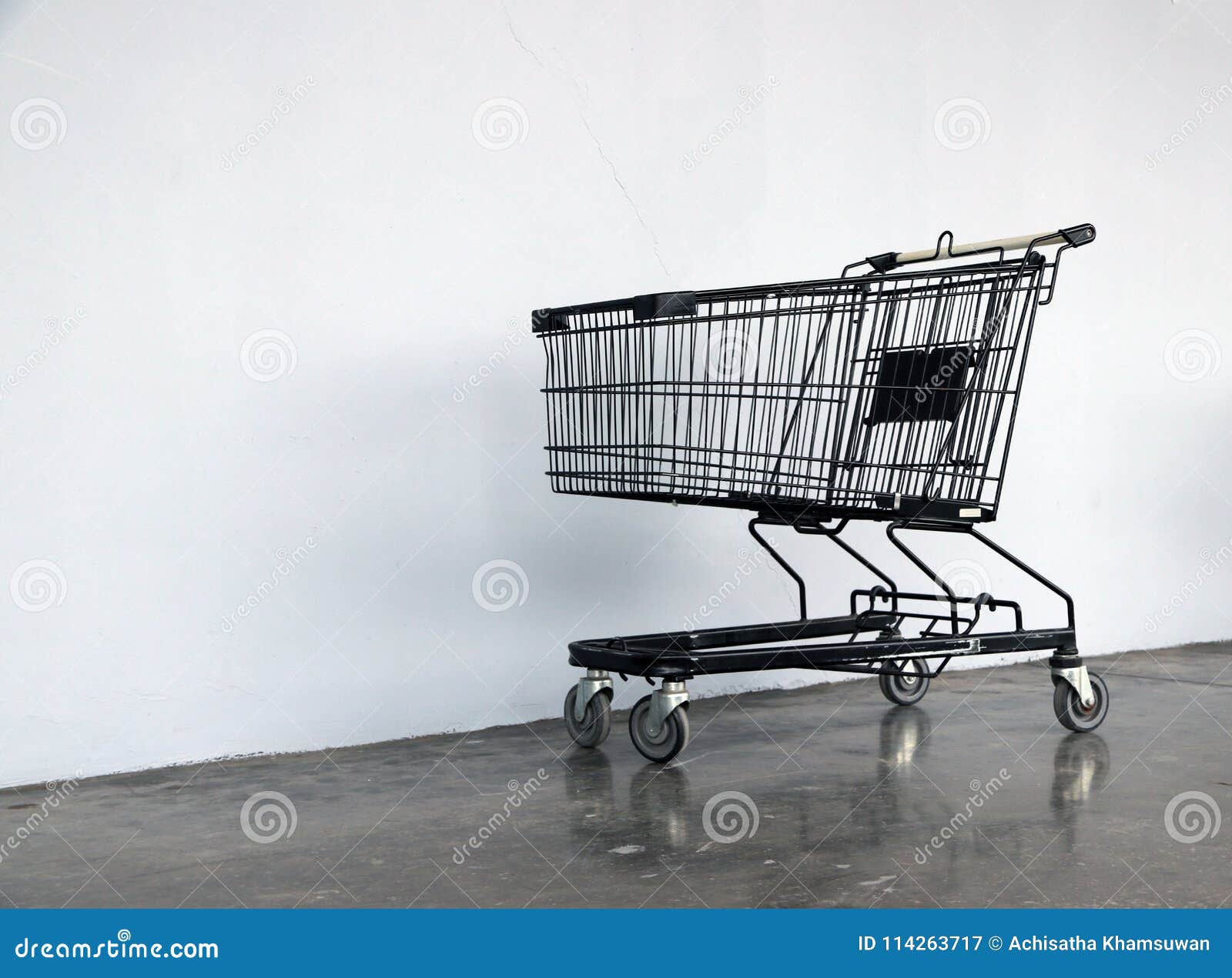 Black Shopping Cart on the Floor and White Background. Stock Image ...
