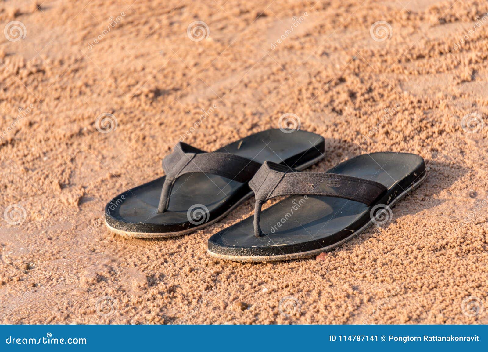 Black Slippers on the Sand Beach Stock Image - Image of sandal, sand ...