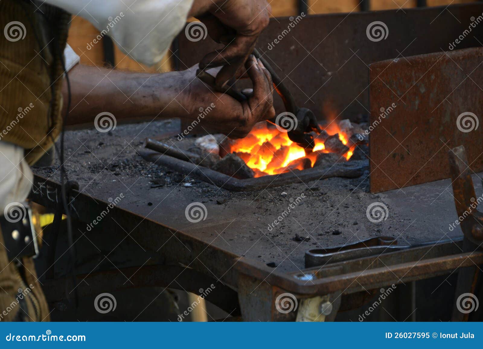 Black Smith Heating Up an Iron Stock Image Image of ancient, industry