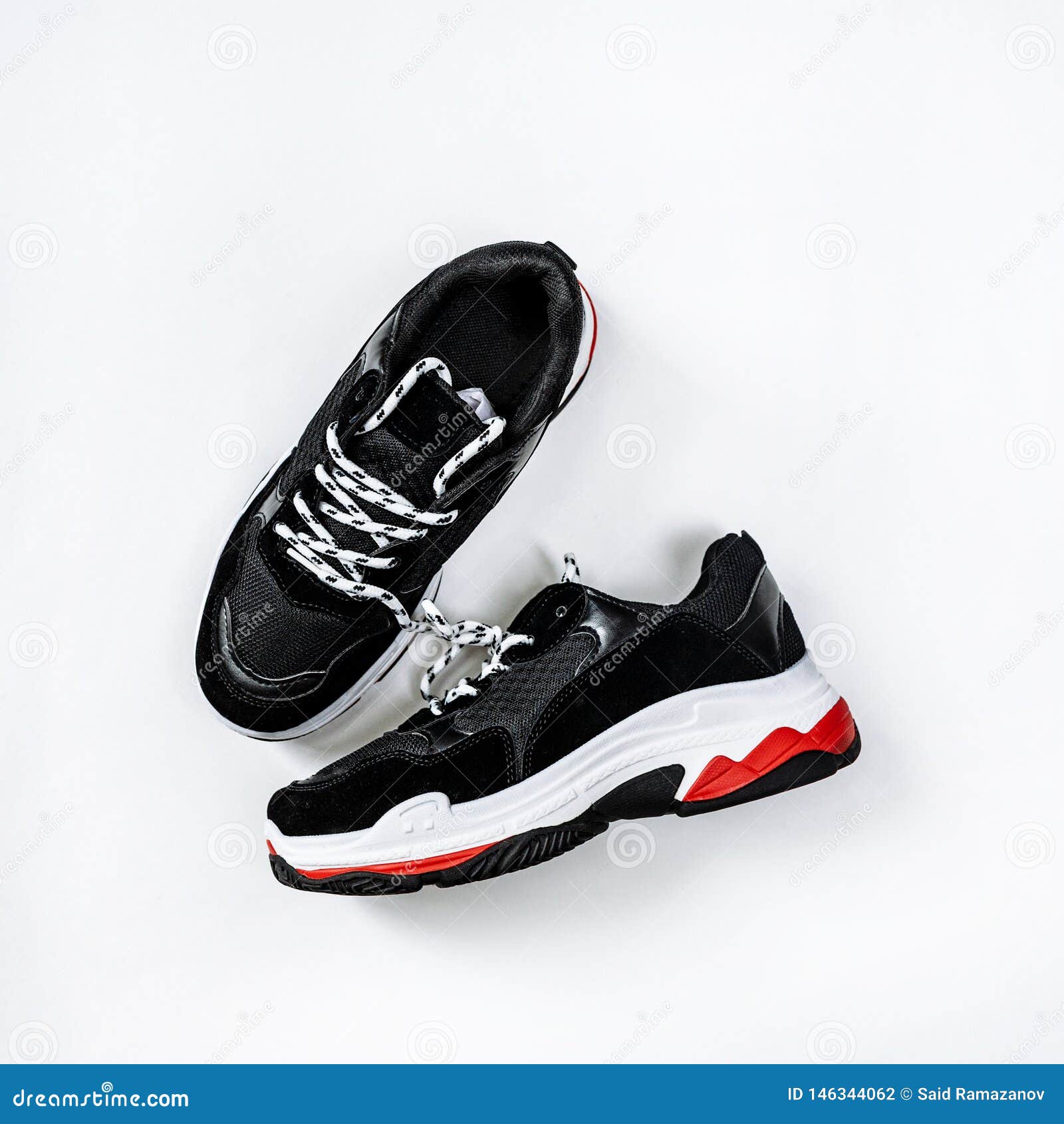 Fashionable shoes. Black and red shoes on a white background Stock